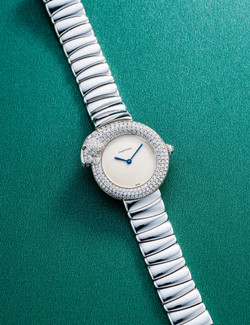 卡地亚  优雅，女装白金镶钻石及绿宝石链带腕表，「Panthère 1925」，型号2476，年份约1990，附原厂表盒