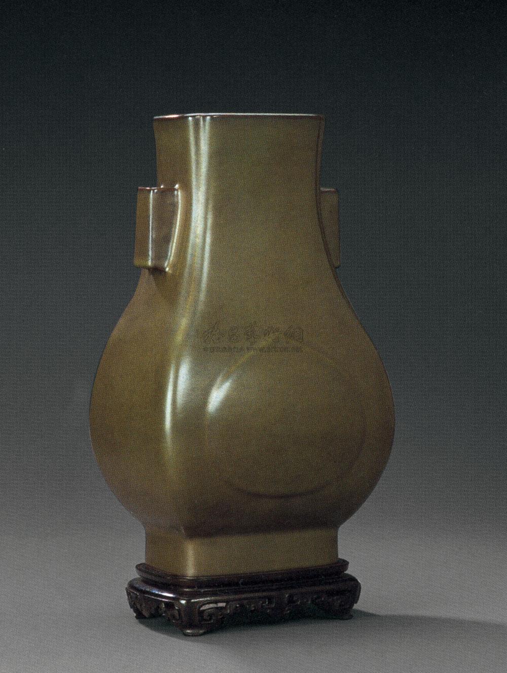 1091清雍正茶叶末釉杏圆贯耳壶