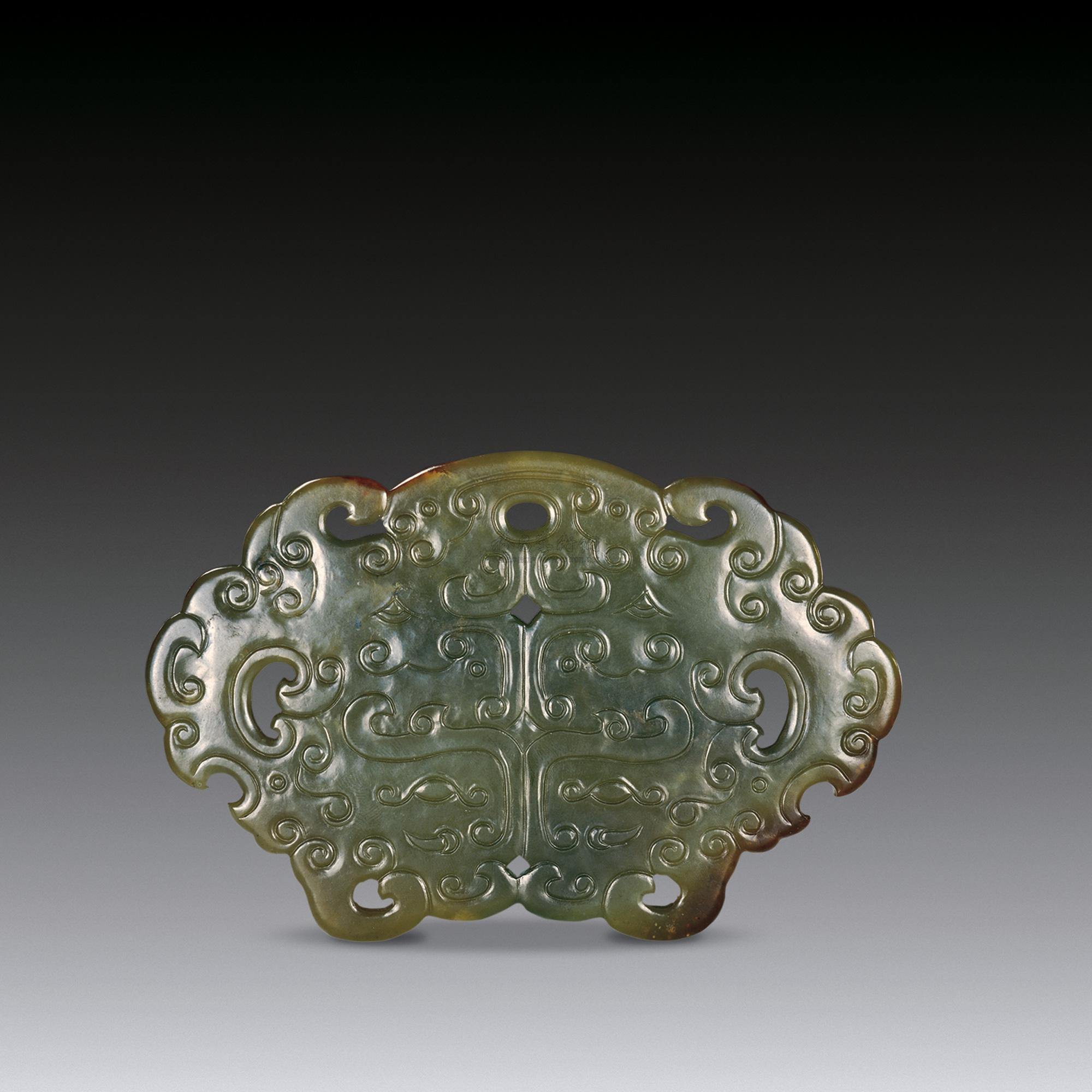 0506 清 黄玉雕兽面纹珮