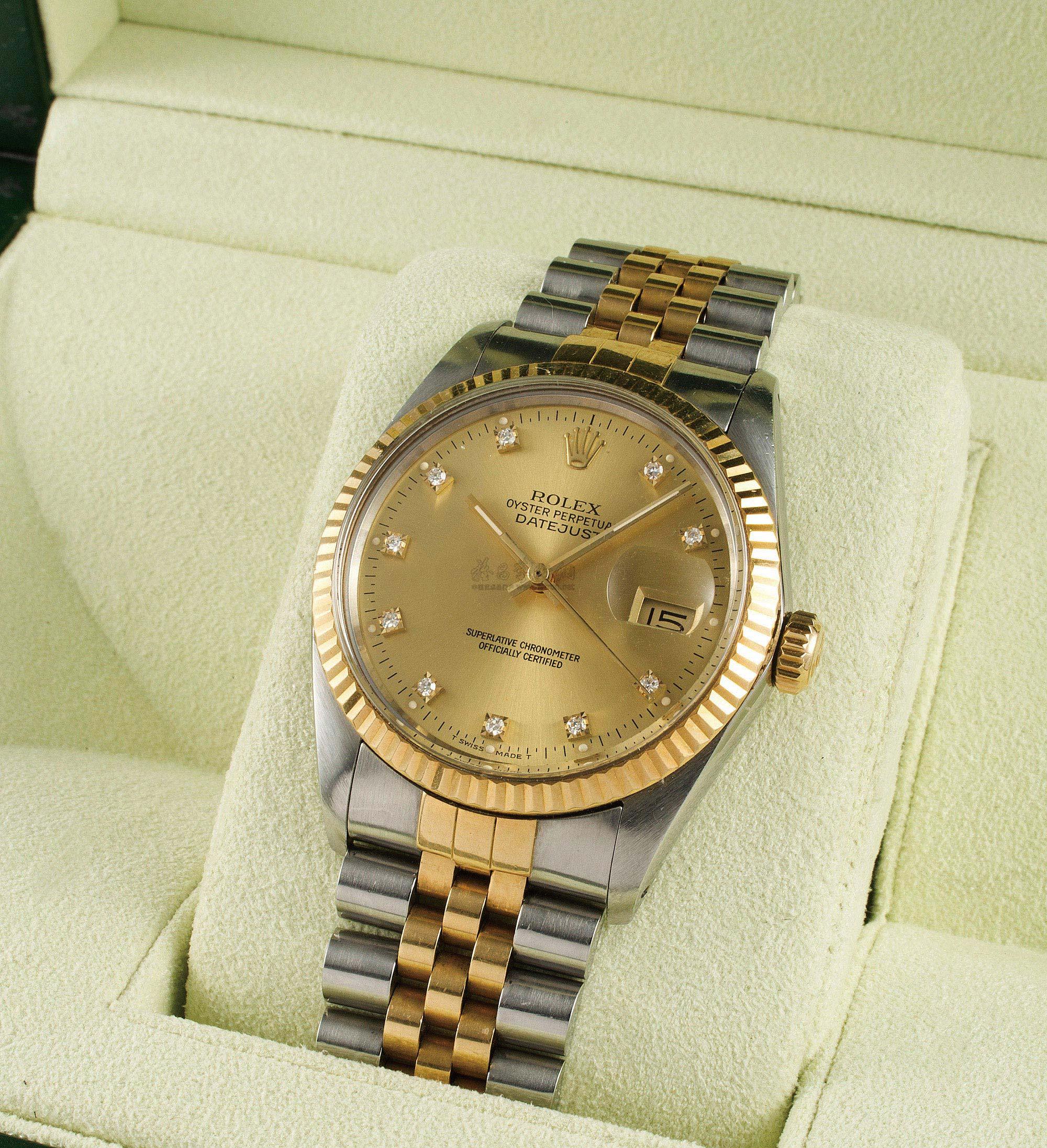 0659劳力士蚝式18k金钢钻石字自动日历连带腕表