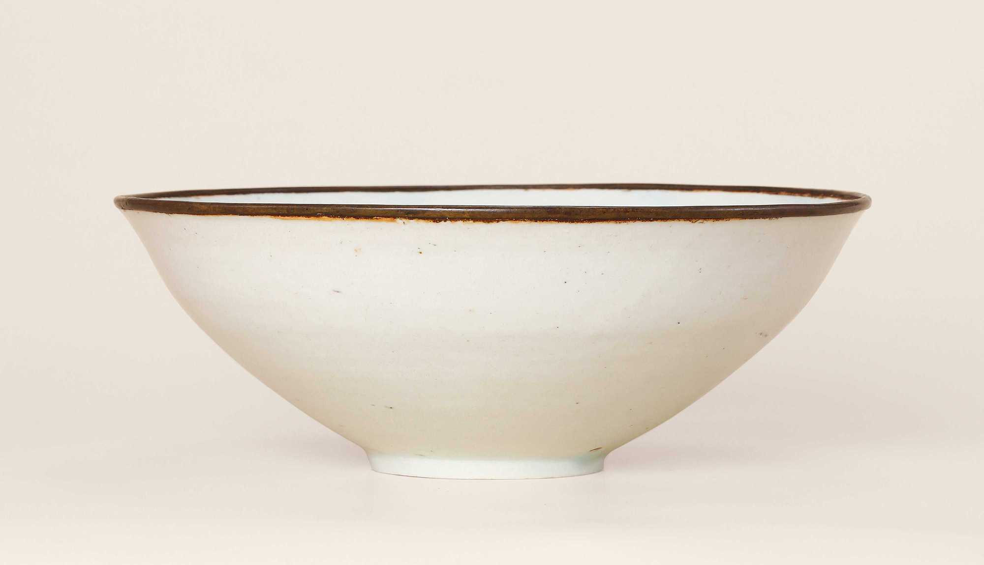 A JINGDEZHEN WARE WHITE GLAZED WITH MOUDLED BOWL