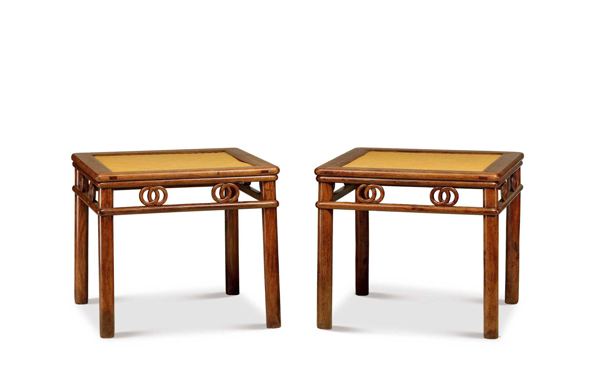 PAIR OF HUANGHUALI WOODEN SQUARE STOOLS WITH ROUNDED LEGS AND STRUTTED BY INTERLOCKING BICYCLO BRACES