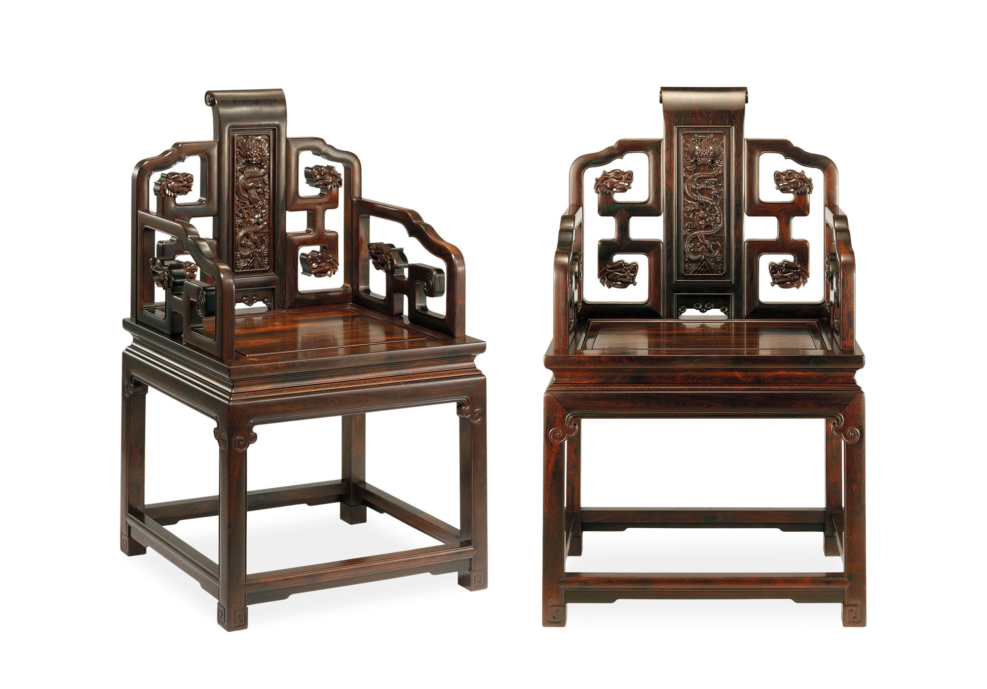 A pair of ZITAN armchairs with dragon patterns
