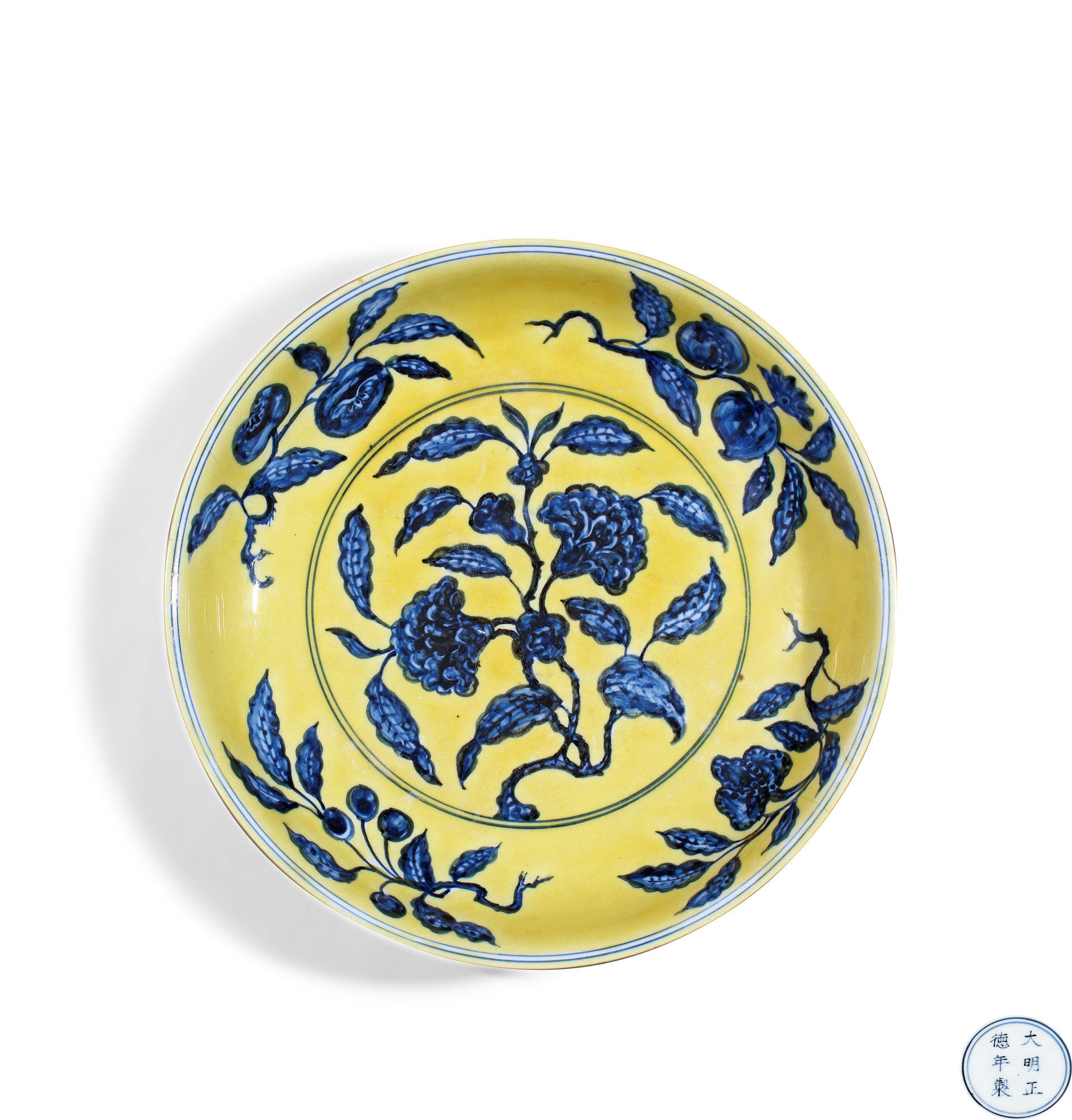 A RARE YELLOW-GROUND BLUE AND WHITE WITH POMEGRANATE FLORAL DISH