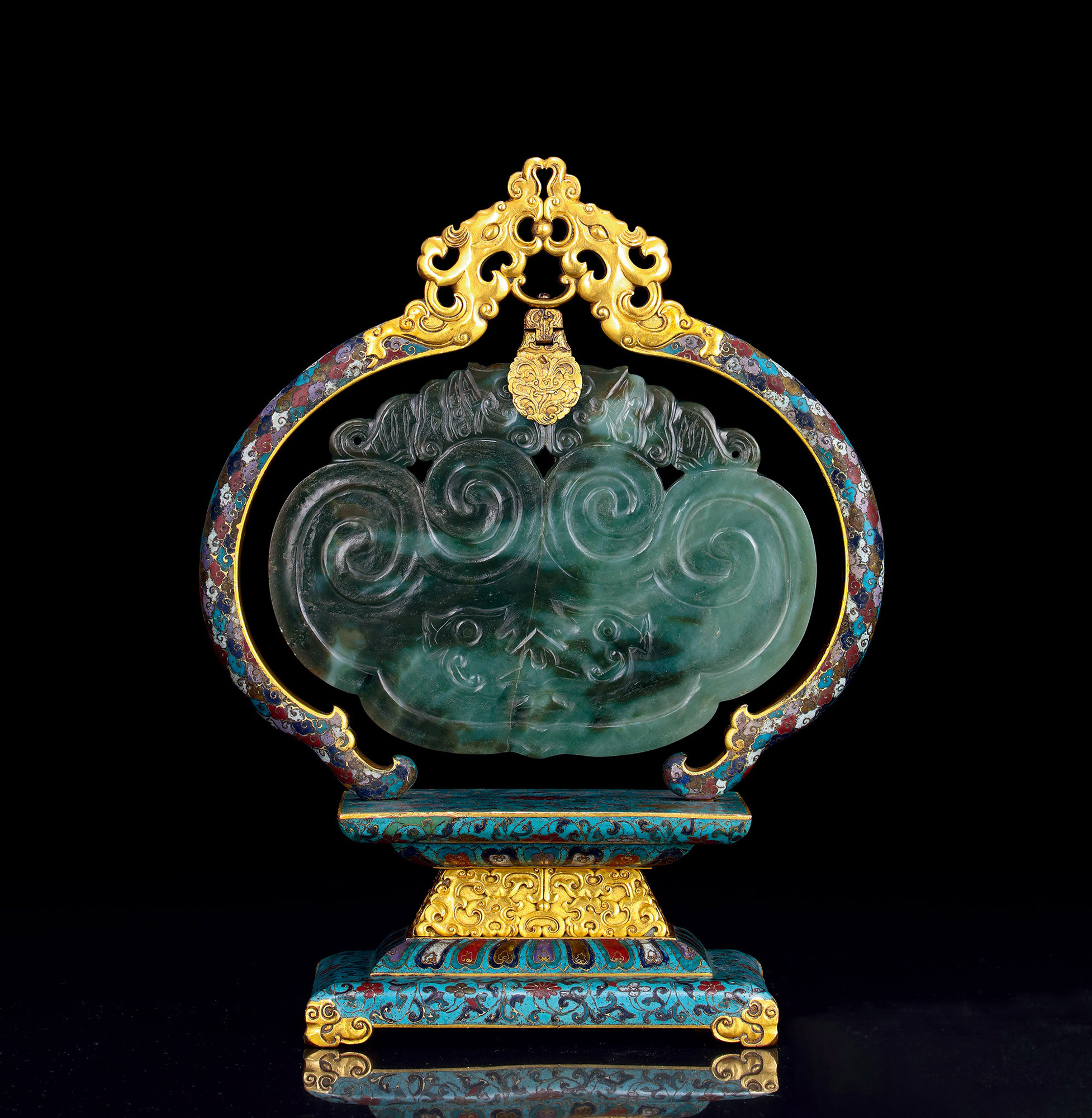 AN IMPERIAL SPINACH GREEN JADE QING-SHAPED CARVING AND CLOISONNE ENAMEL STAND