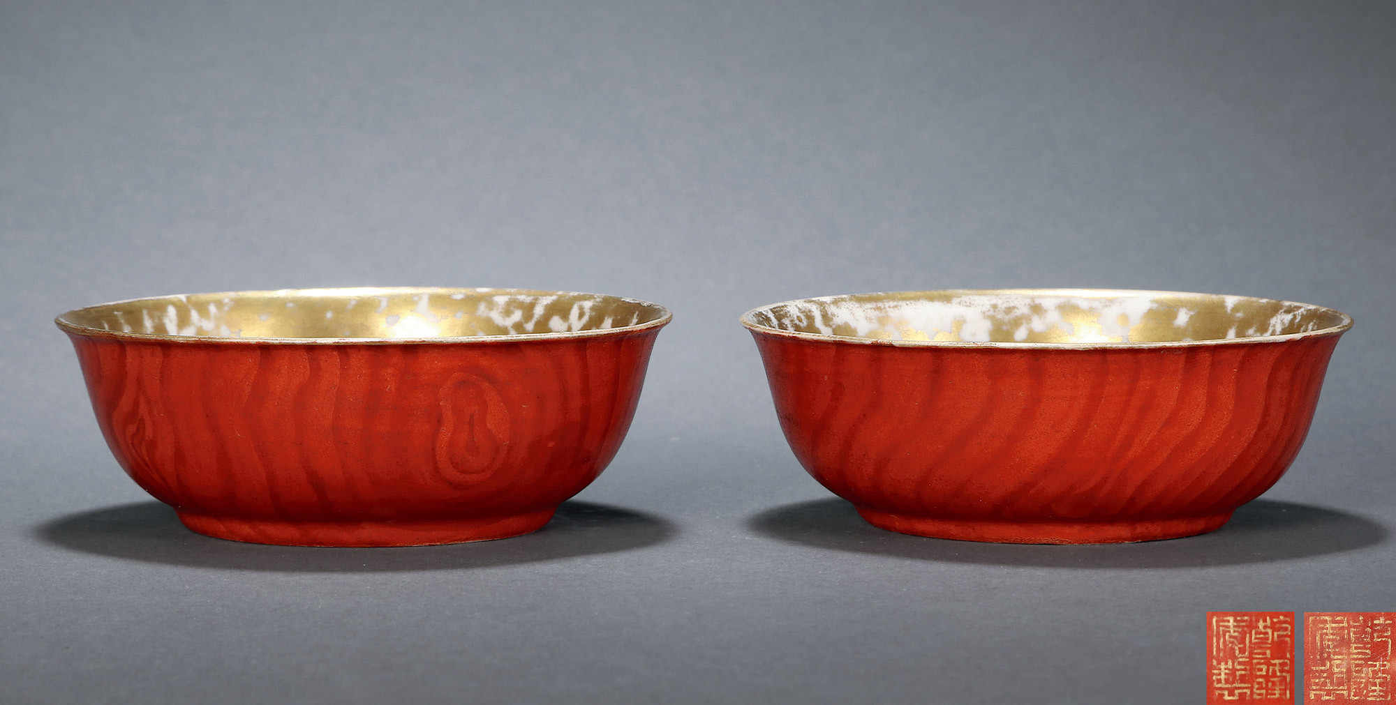 A PAIR OF IMITATED GLAZED GILTED BOWLS