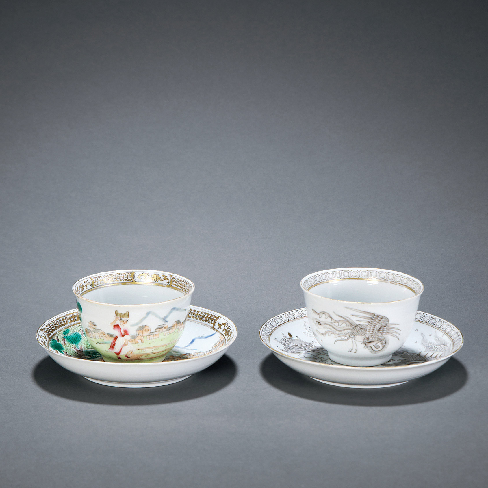 A SET OF FOUR FAMILLE-ROSE‘FIGURES AND DRAGON’CUPS AND PLATES