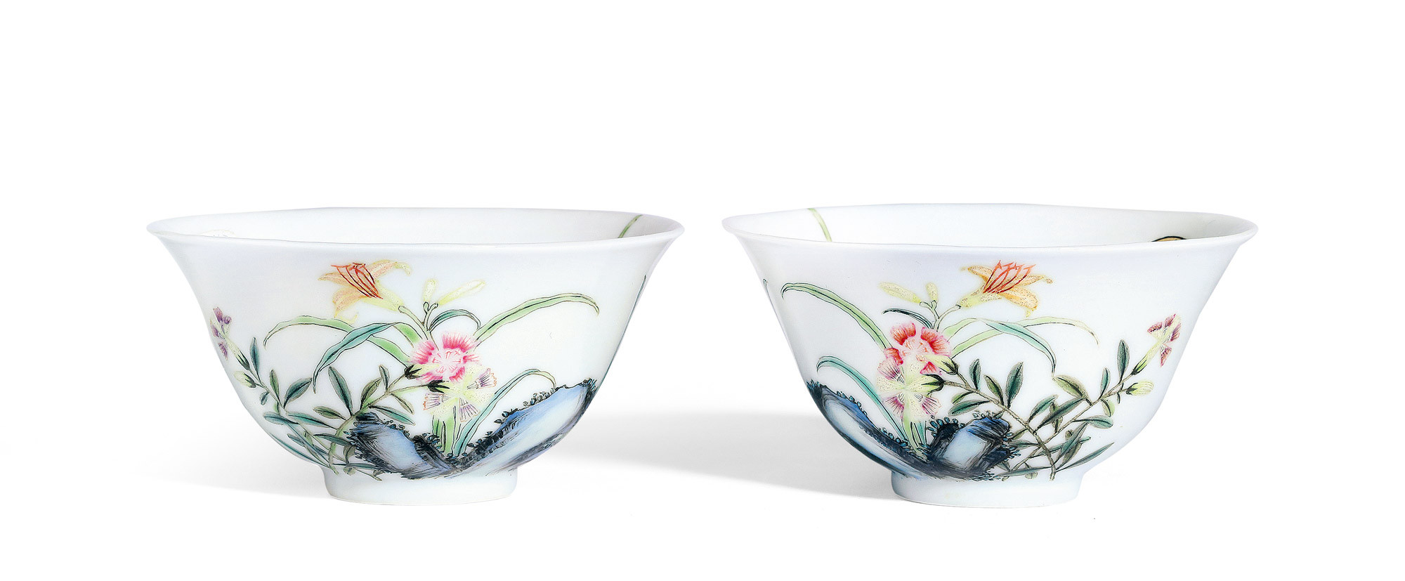 A RARE PAIR OF FAMILLE-ROSE OVER-WALL ‘FLORAL’ CUPS