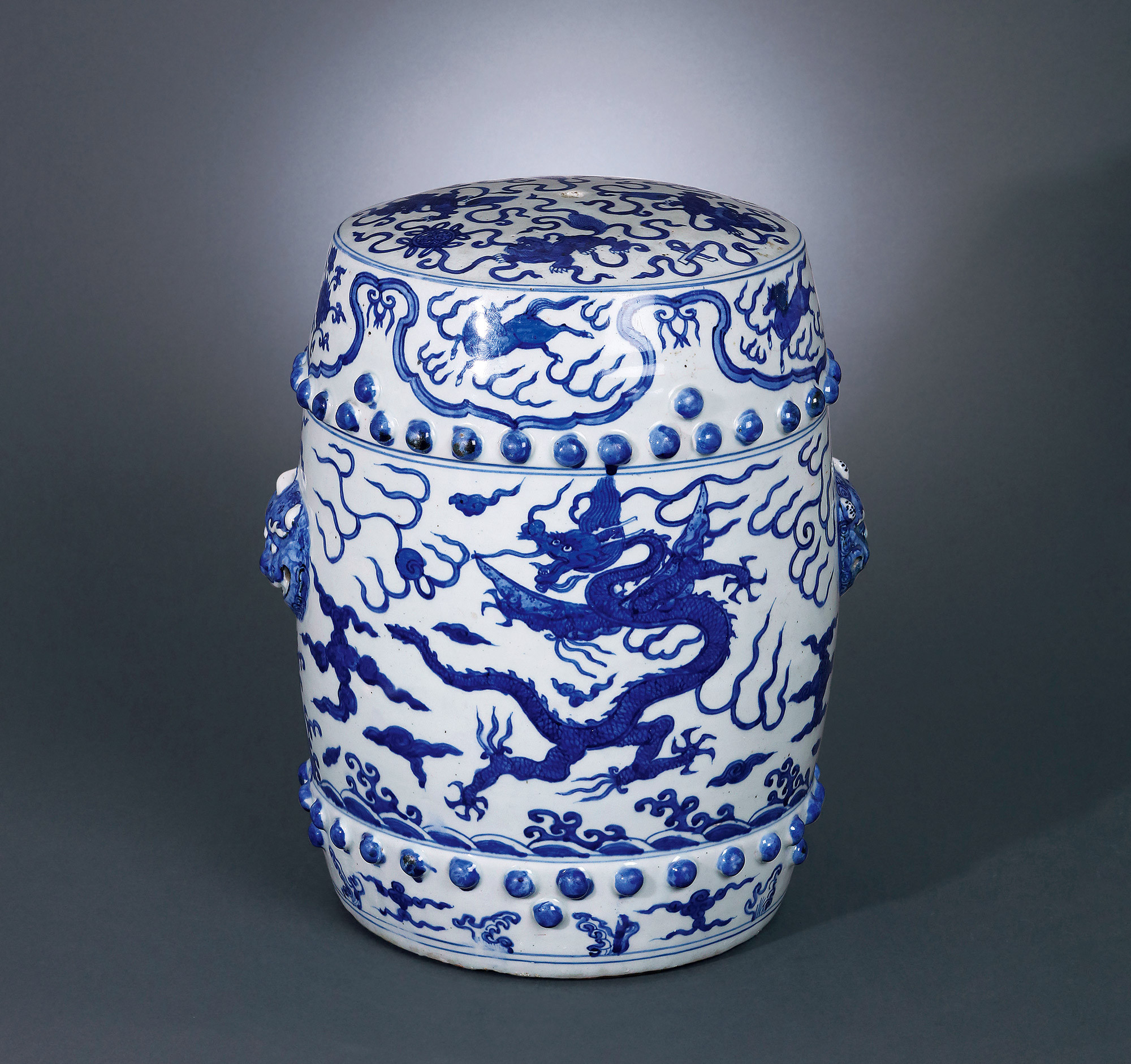 A BLUE AND WHITE ‘DRAGON’ DRUM STOOL