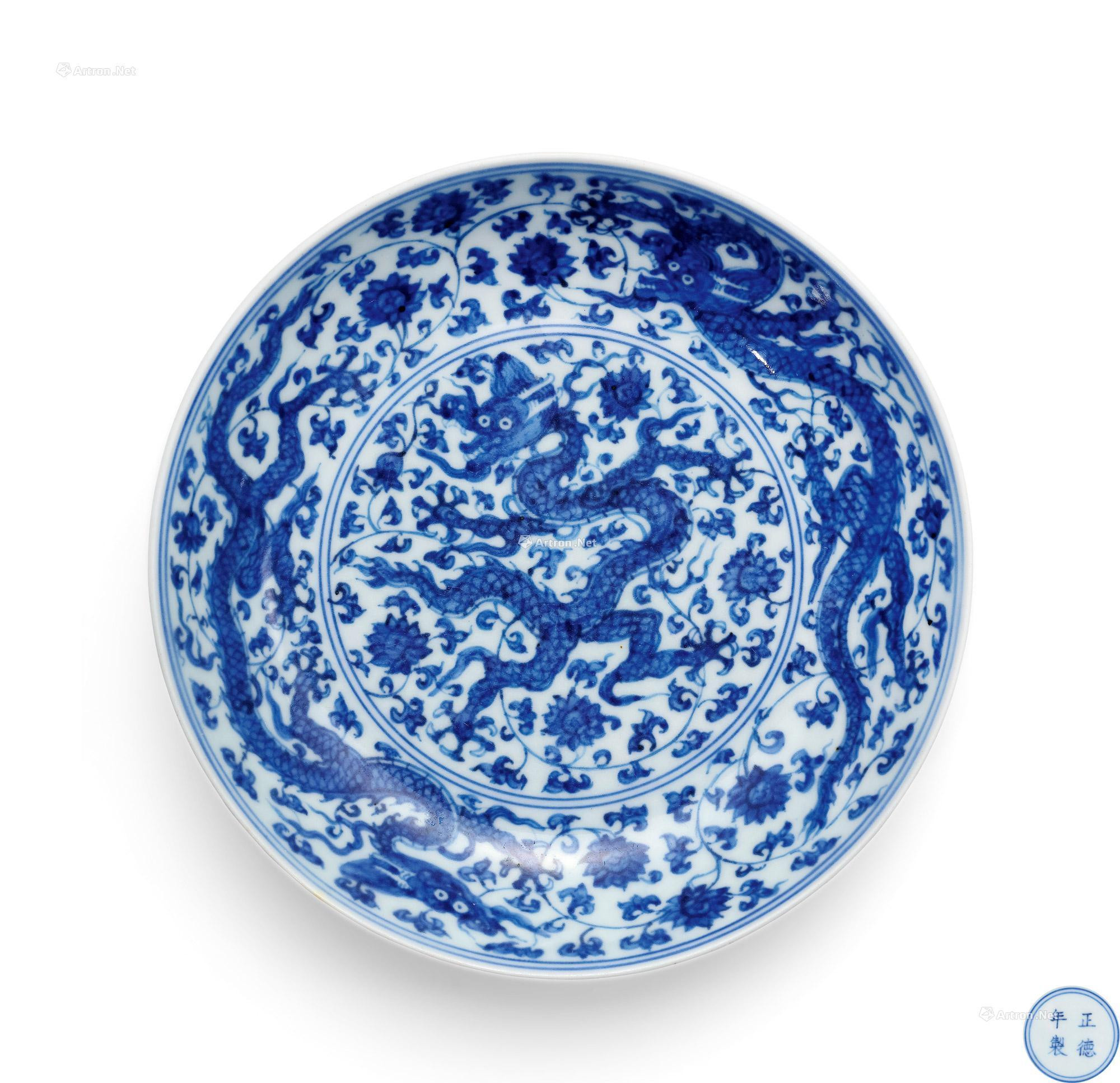 A RARE BLUE AND WHITE‘DRAGON FLYING THROUGH  FLORAL’PLATE