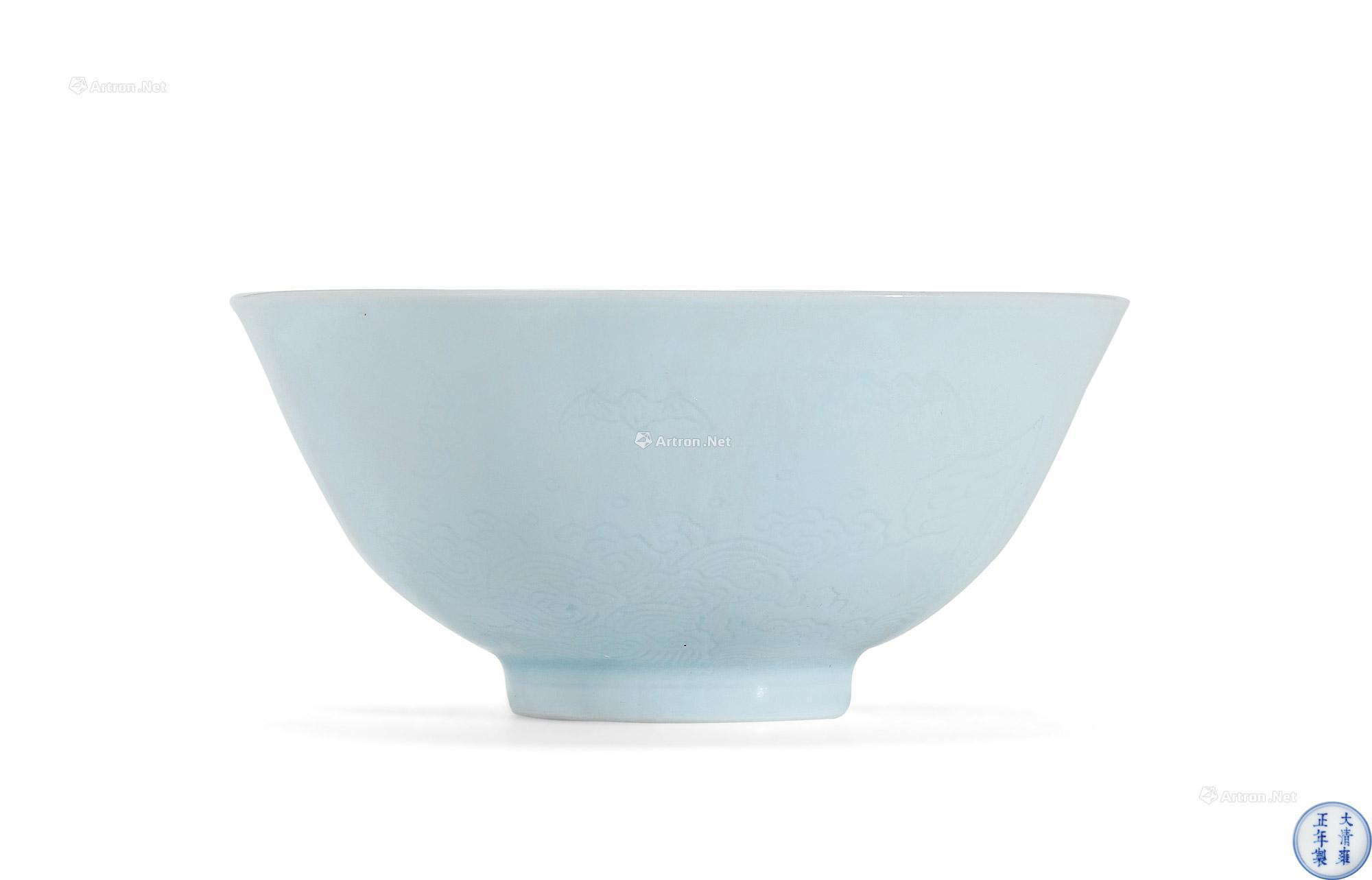 A CELADON GLAZED WITH INCISED ‘BAT AND WAVES’ BOWL