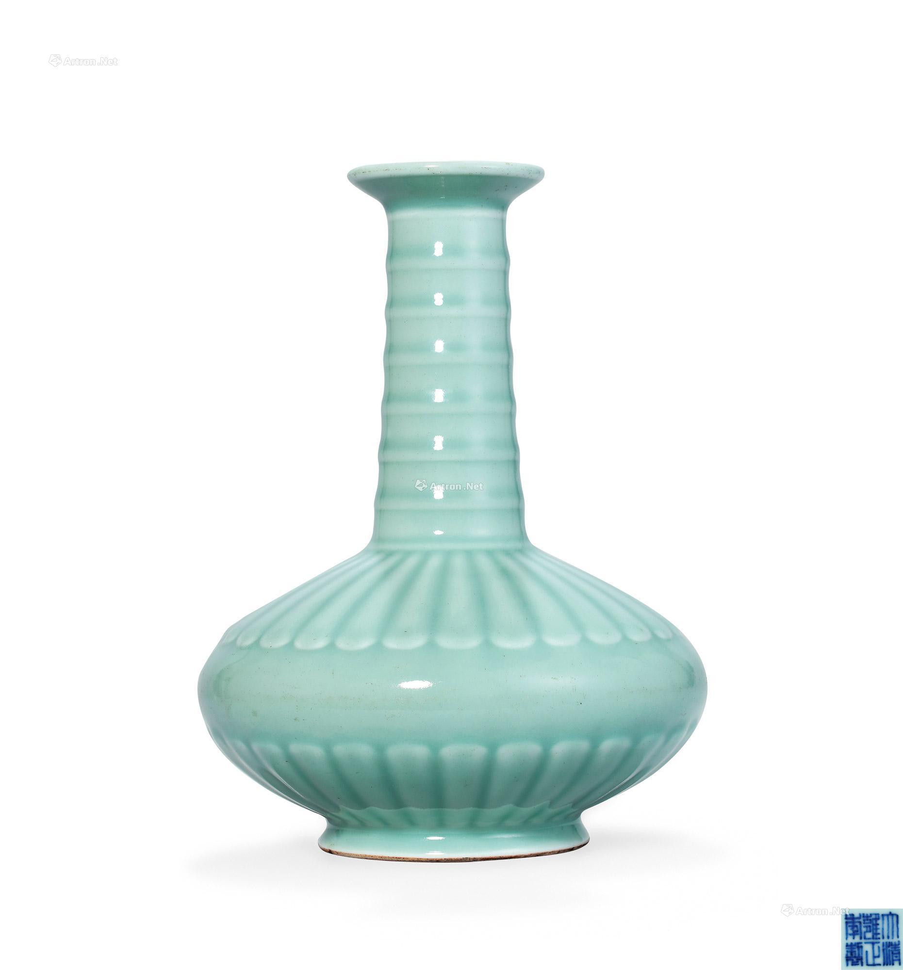 A RARE CELADON GLAZED WITH MOULDED ‘CHRYSANTHEMUM’ VASE