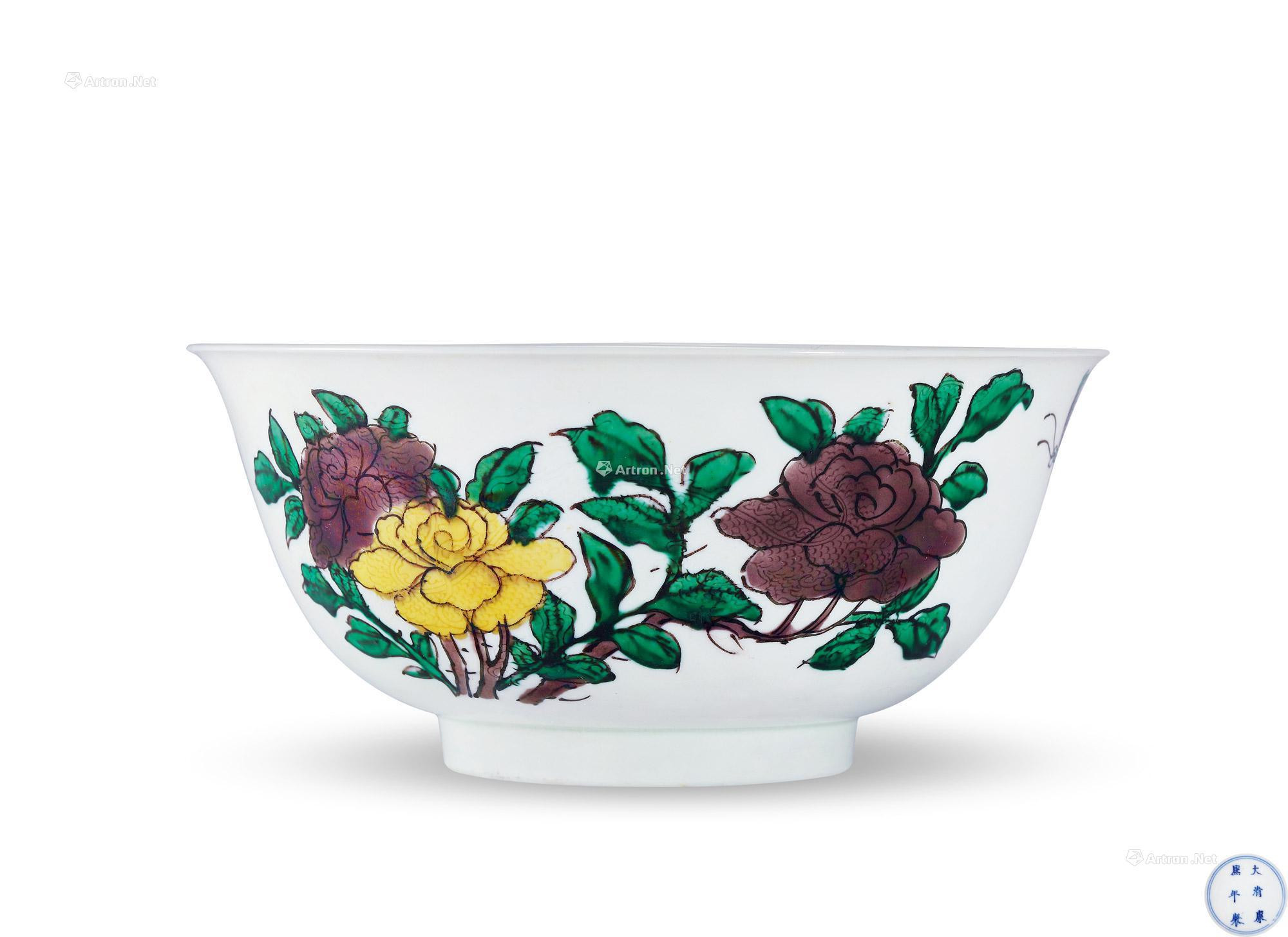 A RARE SANCAI ‘FLORAL’ WITH INCISED DRAGON BOWL
