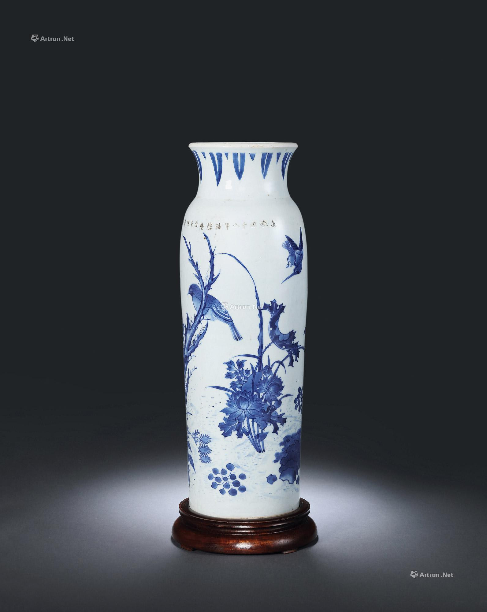A BLUE AND WHITE FLOWERS AND BIRDS VASE