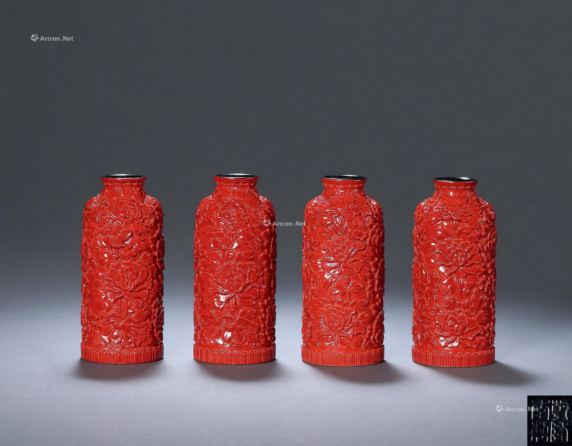 A SET OF FOUR IMITATING RED LACQUERWARE GLAZED PEONY VASES