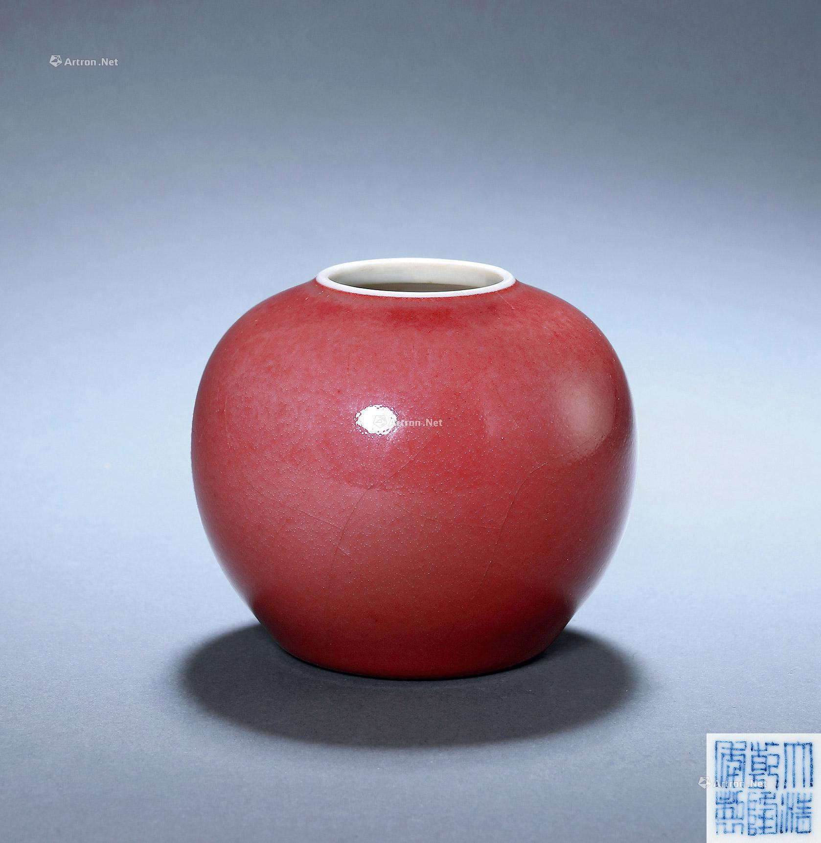 A RED-GLAZED WATER POT