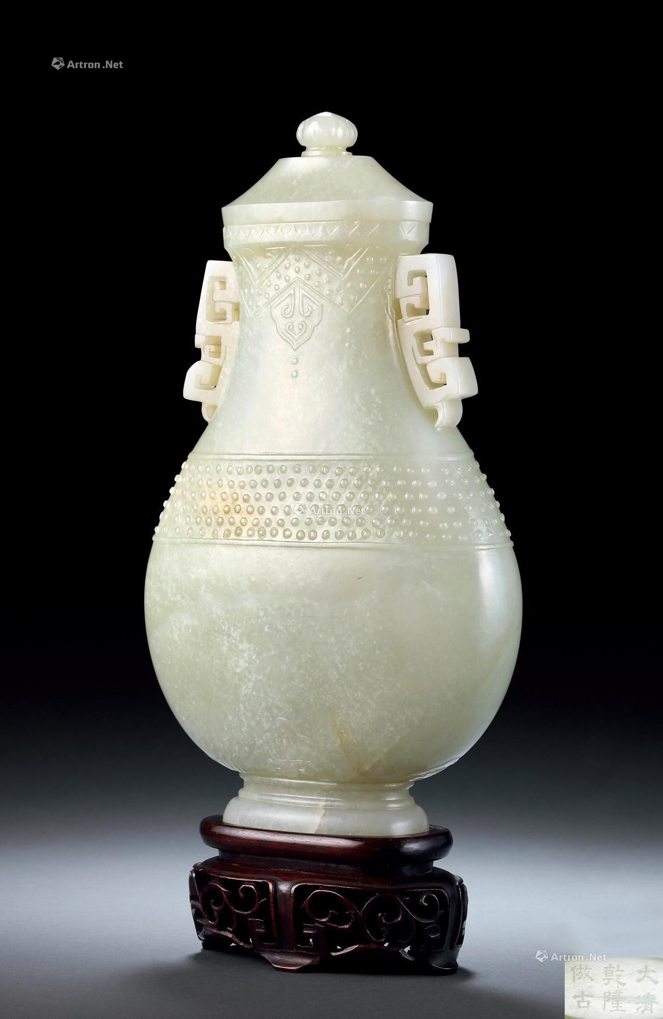 A PALE CELADON JADE ARCHAISTIC VASE AND COVER