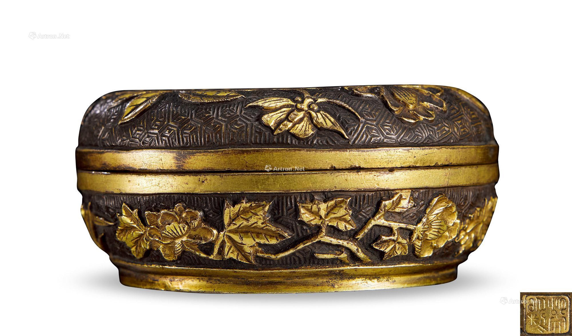 A PARCEL-GILT BRONZE INCENSE BOX AND COVER