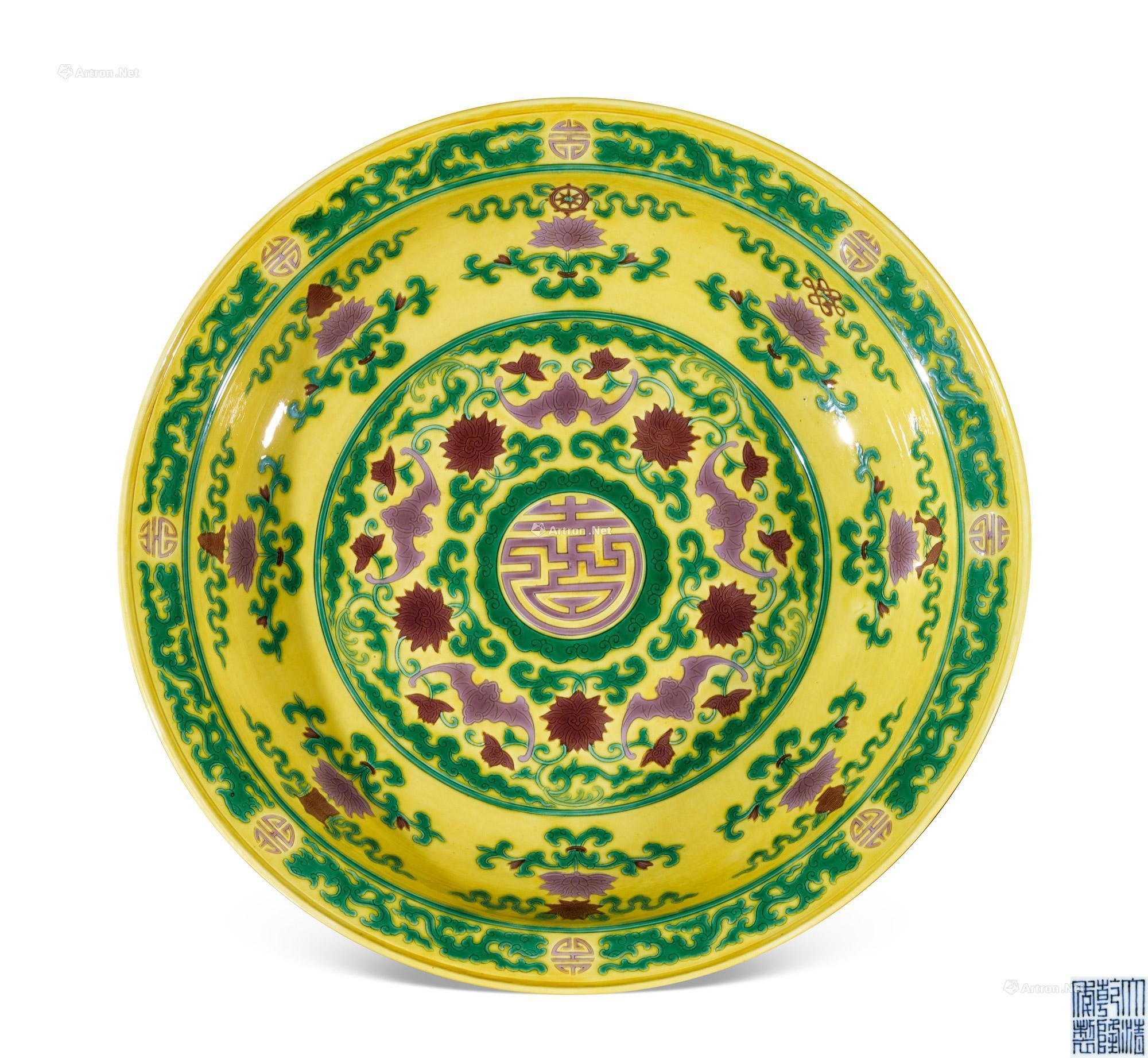 A YELLOW-GROUND GREEN AND AUBERGINE-ENAMELLED DISH
