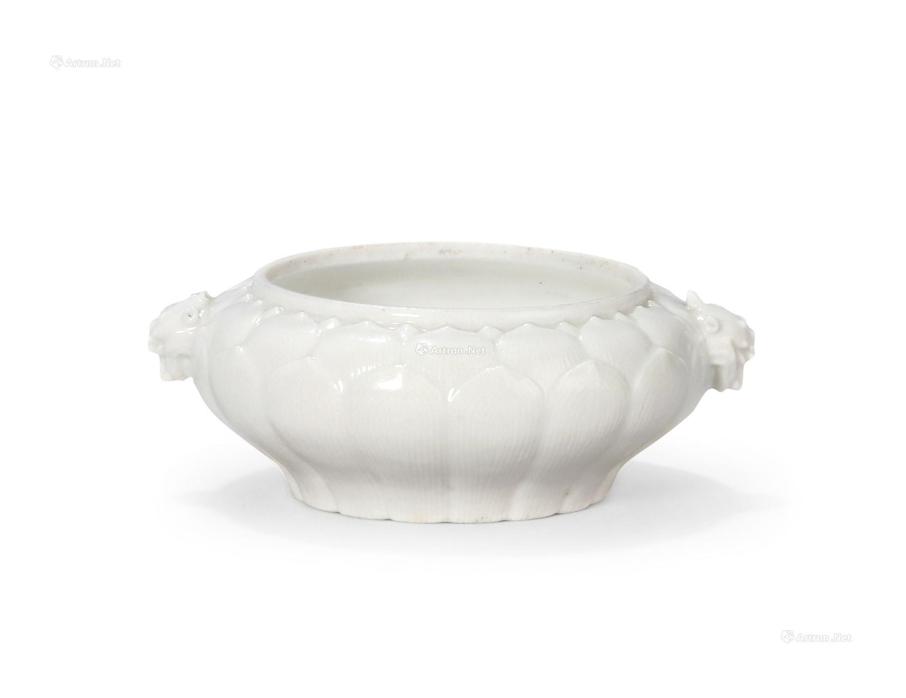 A WHITE GLAZED MOULDED ‘LOTUS’ WATERPOT