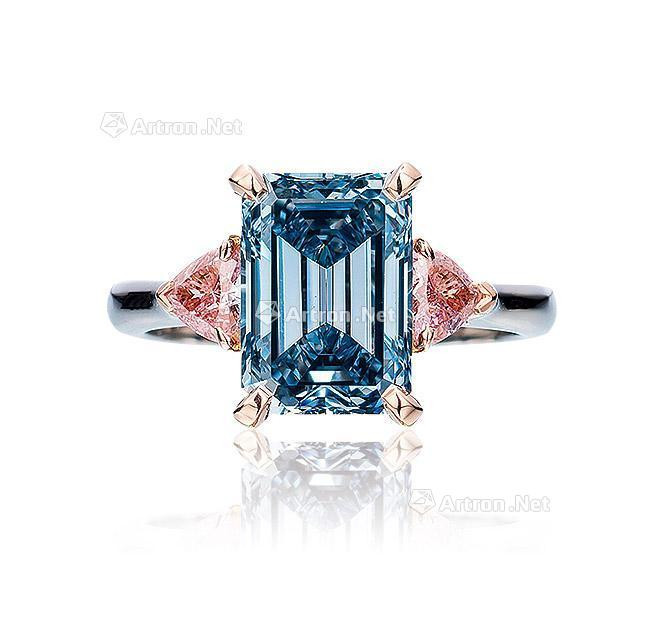 A SUPERB 3.01 CARAT FANCY VIVID BLUE DIAMOND AND DIAMOND RING