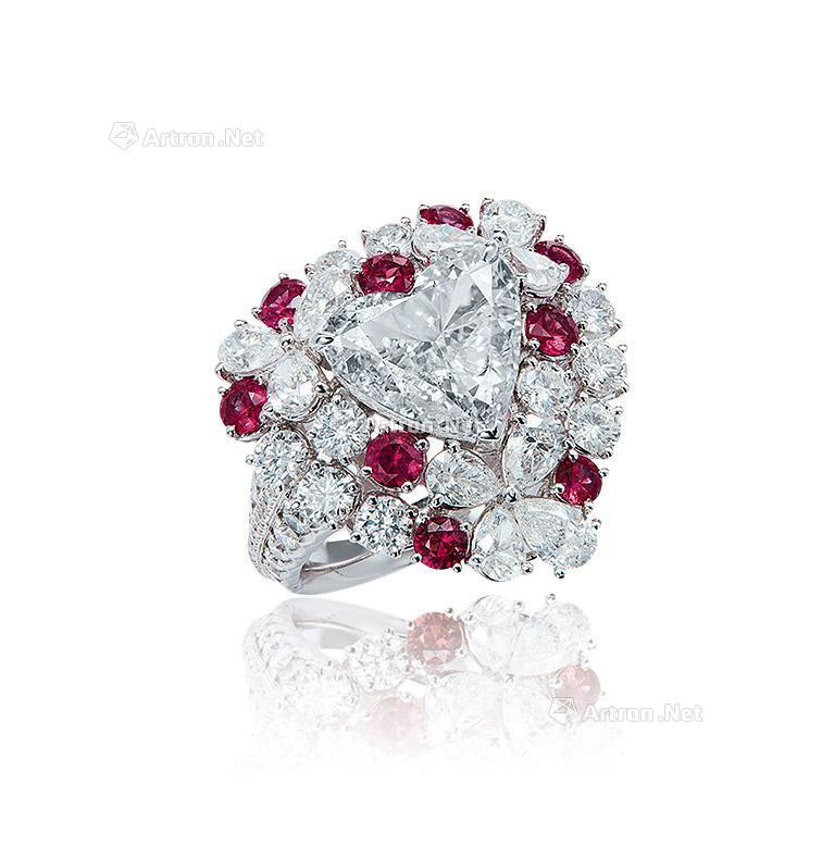A 3.08 CARAT E COLOR DIAMOND AND RUBY RING