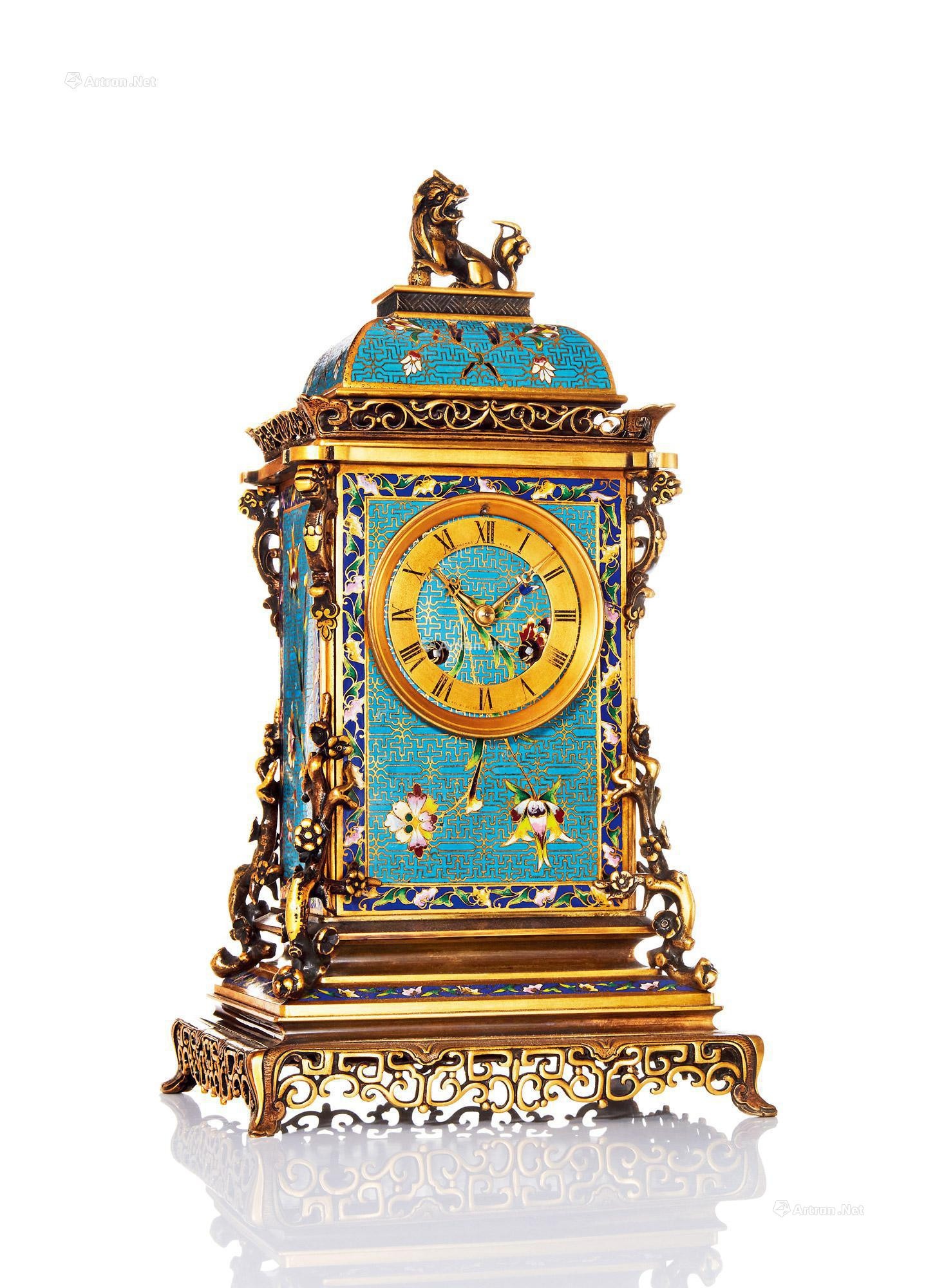 EUROPE  A FINE AND RARE BRASS ENAMEL TABLE CLOCK WITH FLORAL PATTERNS