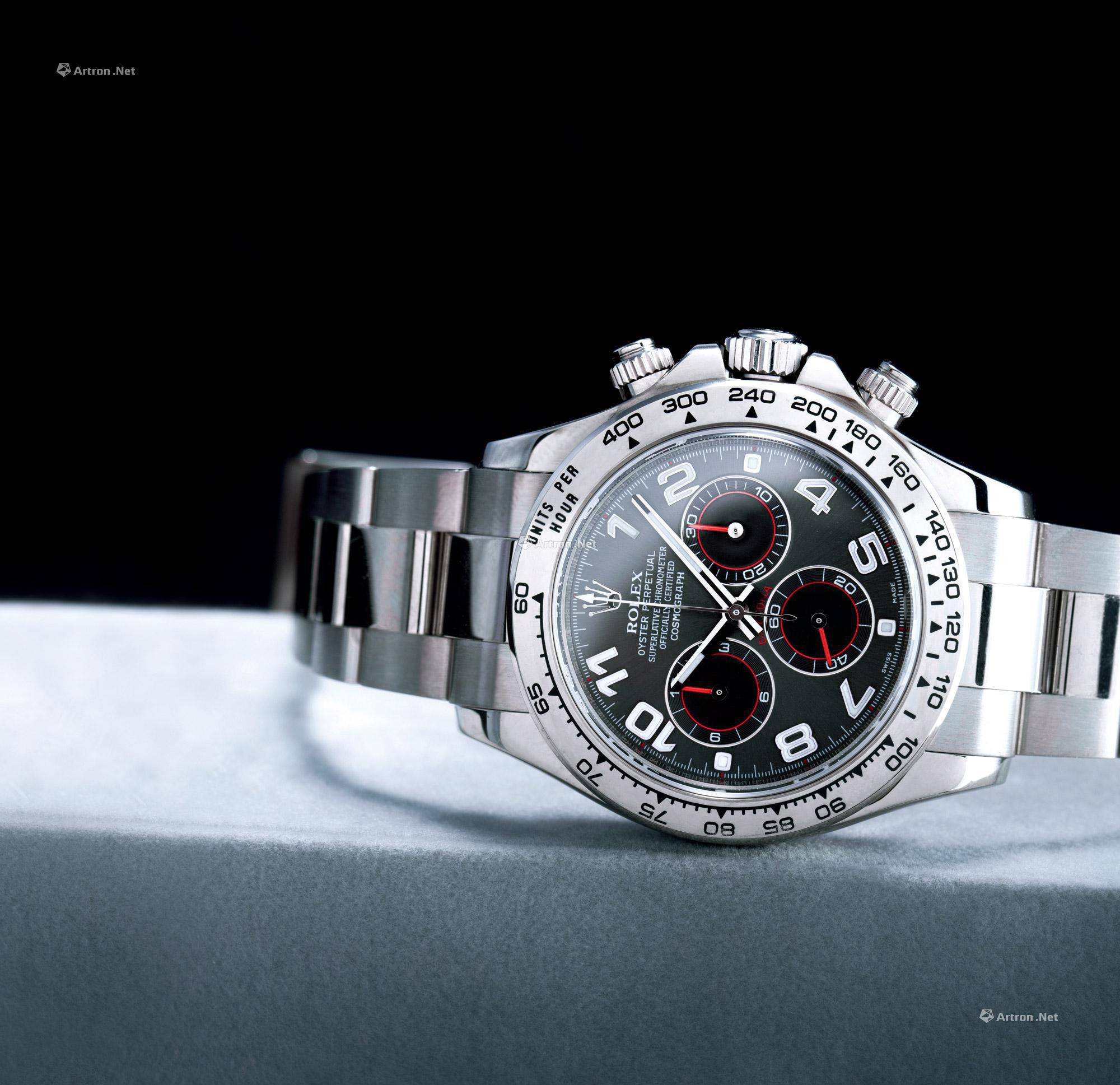 ROLEX  A FINE WHITE GOLD CHRONOGRAPH AUTOMATIC BRACELET WATCH， WITH SMALL SECONDS AND TACHYMETER
