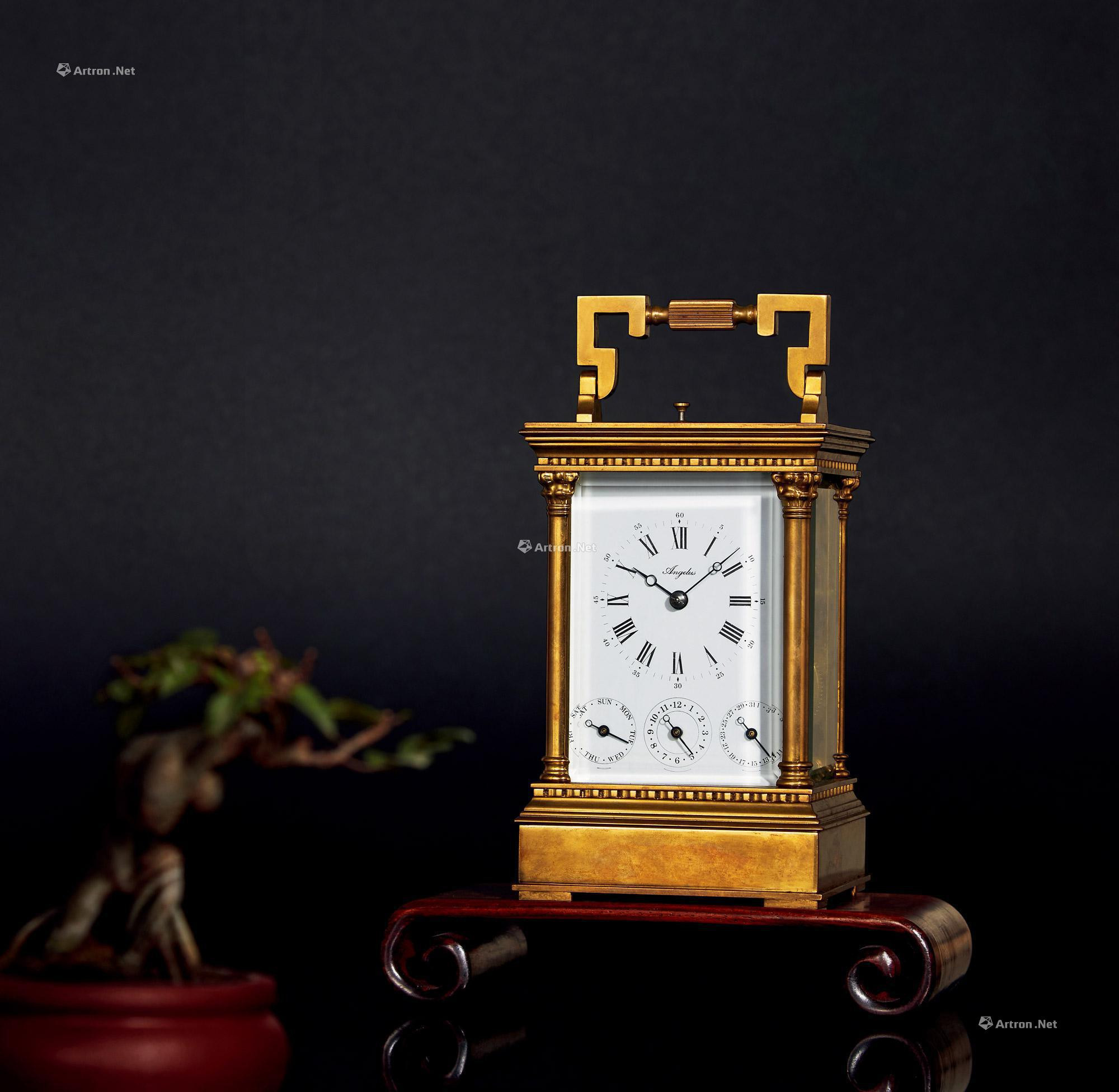 LEPINE  A FINE BRASS MECHANICAL TABLE CLOCK， WITH DATE， DAY AND ALARM