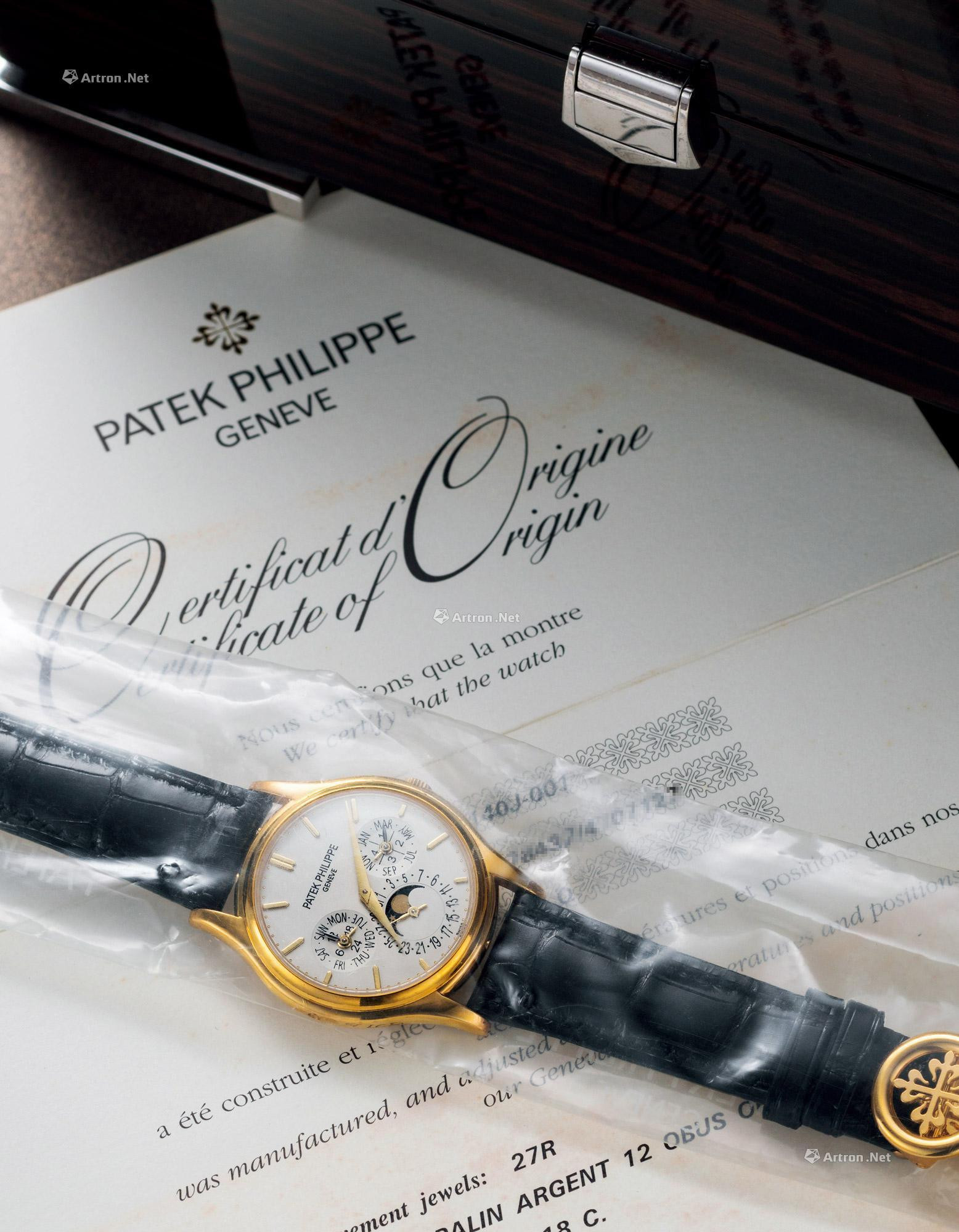 PATEK PHILIPPE  A VERY FINE YELLOW GOLD PERPETUAL CALENDAR AUTOMATIC WRISTWATCH， WITH DATE， DAY， MONTH， LEAP YEAR， 24-HOUR AND MOON PHASES INDICATORS， IN SINGLE SEALED CONDITION， CERTIFICATE OF ORIGINL AND PRESENTATION BOX