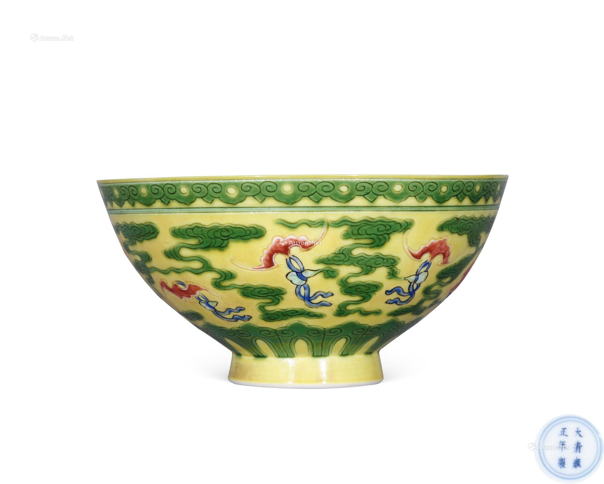 A YELLOW-GROUND GREEN ENAMELLED ‘BAT’ BOWL WITH POLYCHROME DETAILS