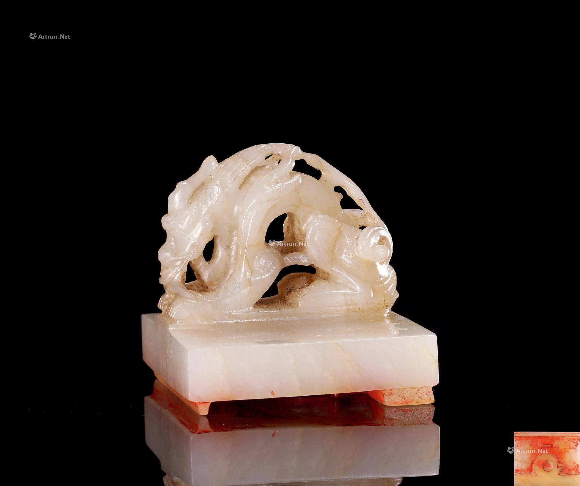 A JADE CARVED SEAL WITH DRAGON-KNOB