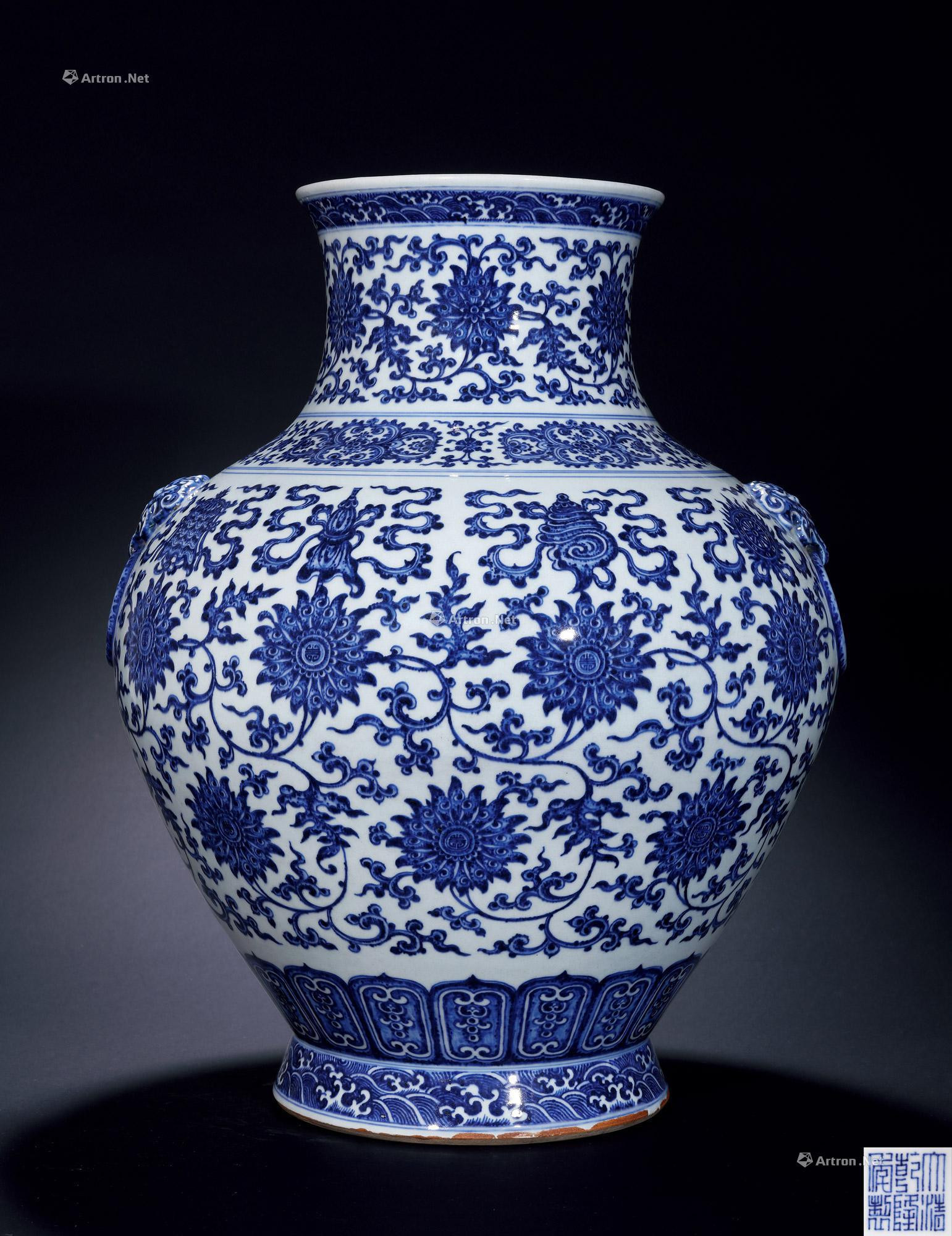 A BLUE-AND-WHITE EIGHT-TREASURE WITH SCROLLING LOTUS PATTERN VASE