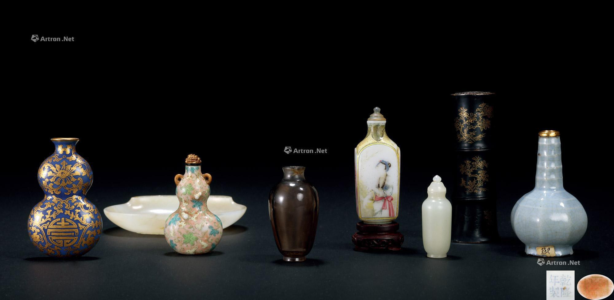 A TIXI-LACQUER AND GOLD-PAINTED SCHOLAR’S BOX WITH EIGHT PIECES OF GLASS SNUFF BOTTLES AND FAMILLE ROSE VASES
