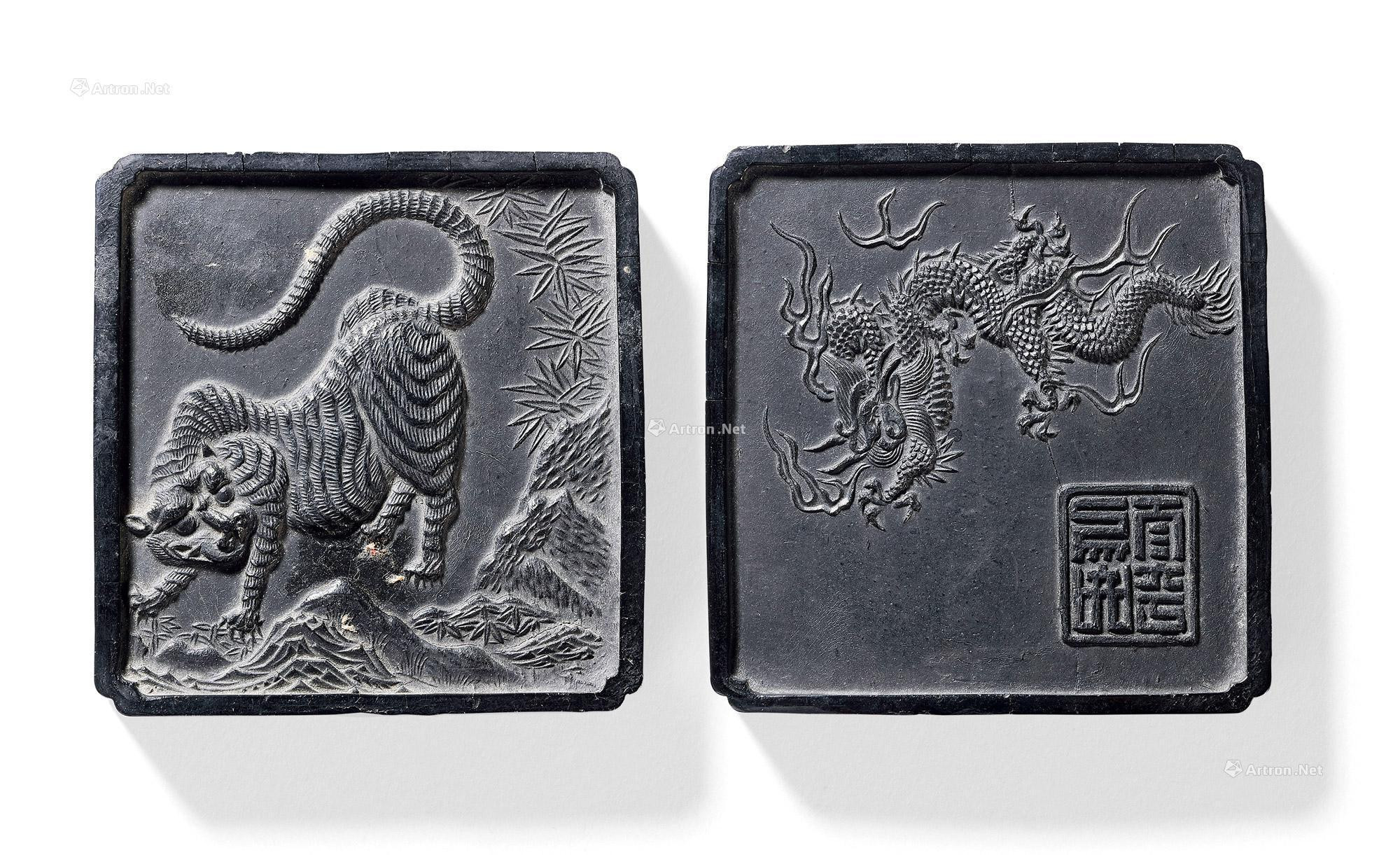 A INK STICKS WITH DESIGN OF DRAGON AND TIGER
