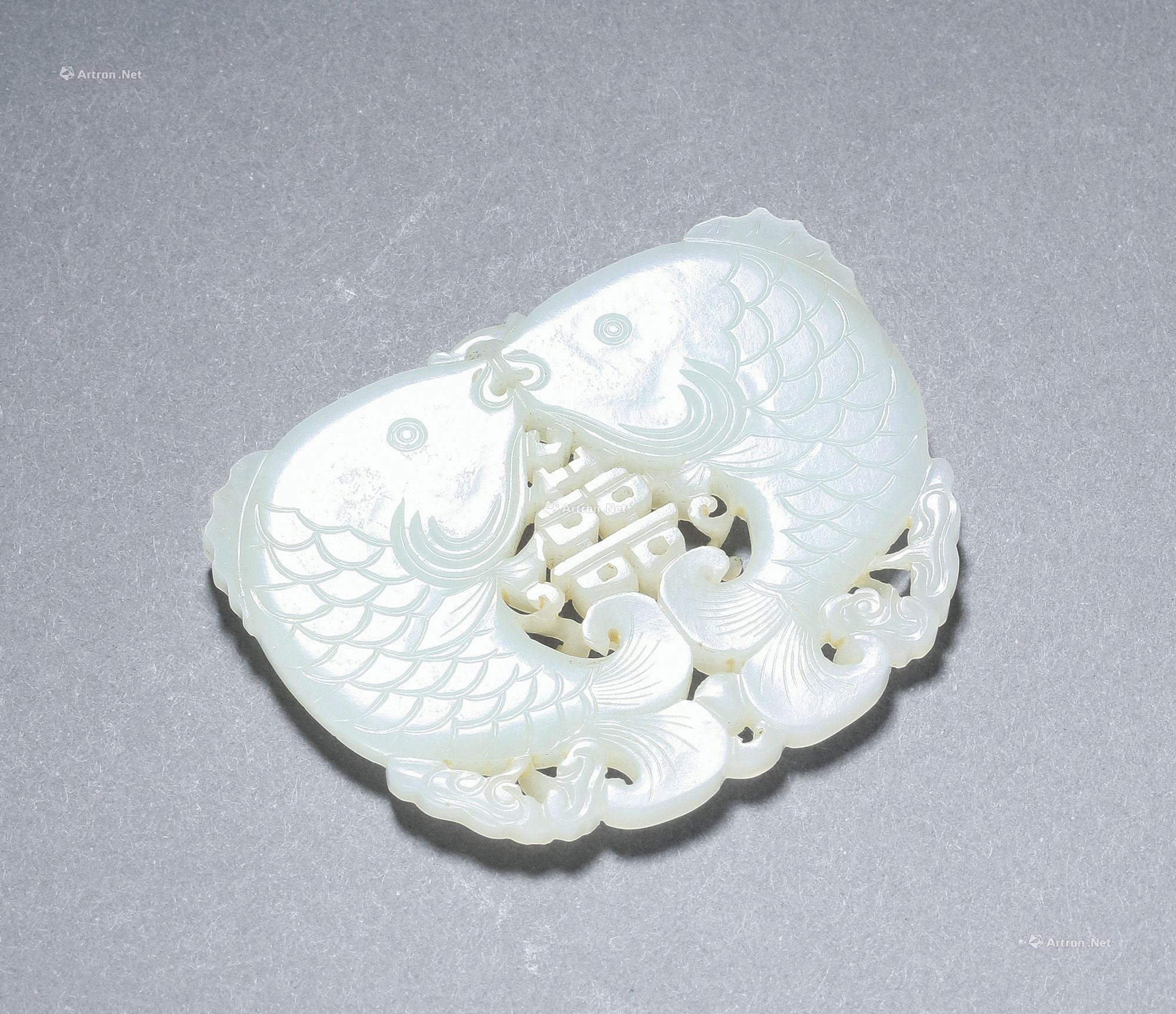 A WHITE JADE ‘XI’ PENDANT WITH DESIGN OF DOUBLE FISHES