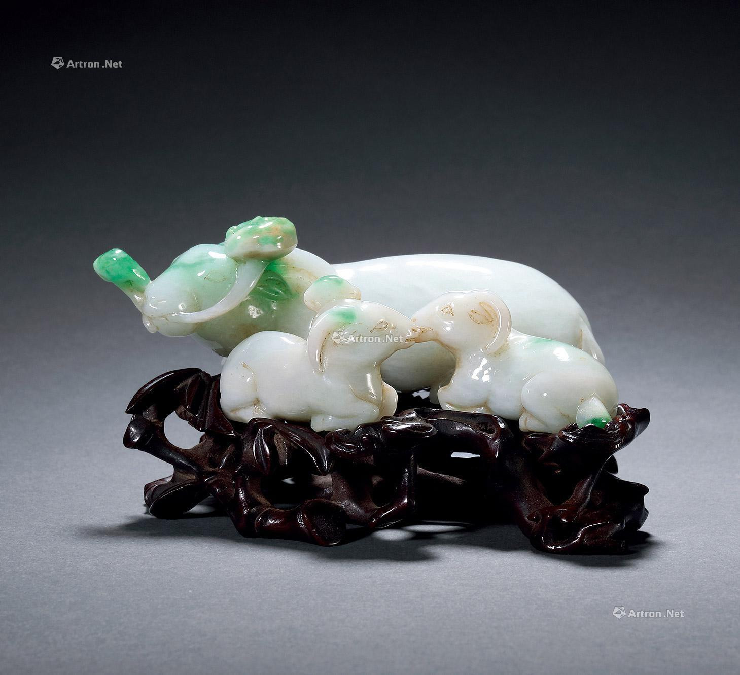 A CARVED JADEITE THREE RAMS BRING BLISS