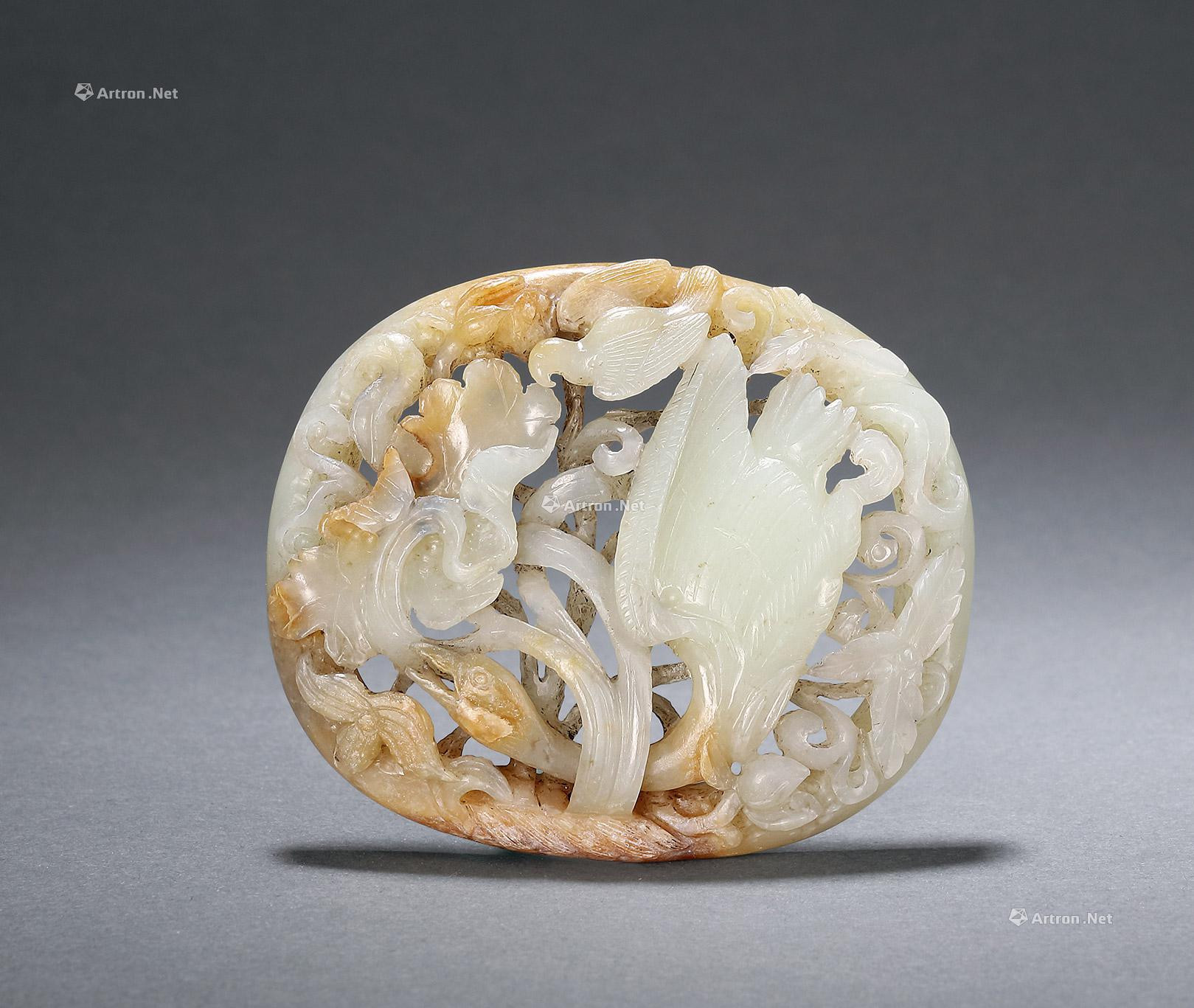 A PIERCED AND CARVED GREENISH JADE PENDANT WITH DESIGN OF SPRING HUNT