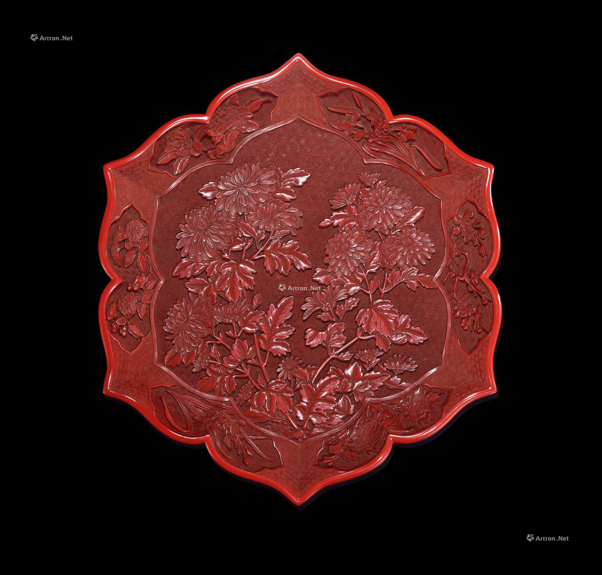 A CARVED RED LACQUER WARE PLATE