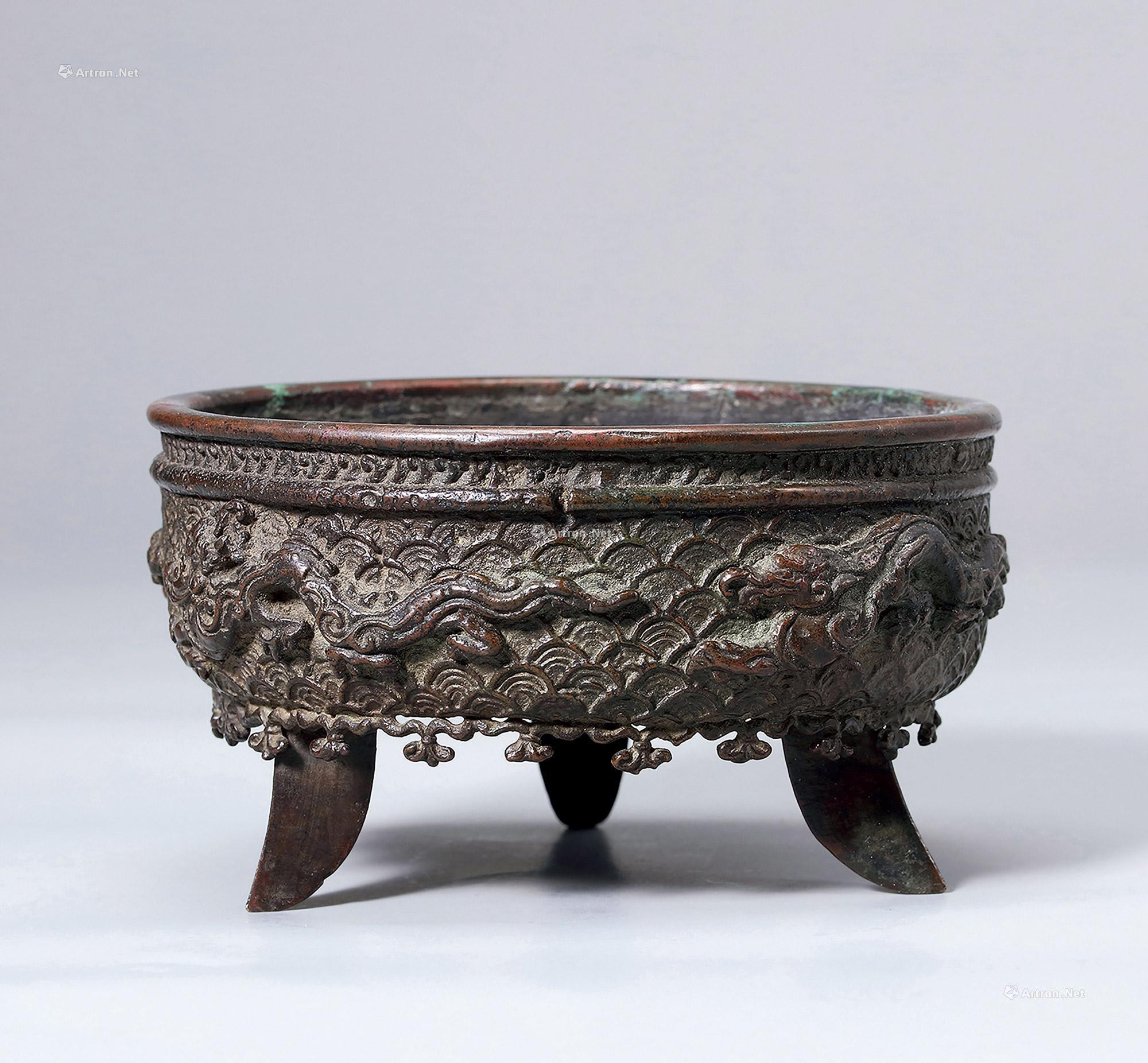 A BRONZE ‘MYSTERIOUS-BEASTS AND SEA’ TRIPOD CENSER