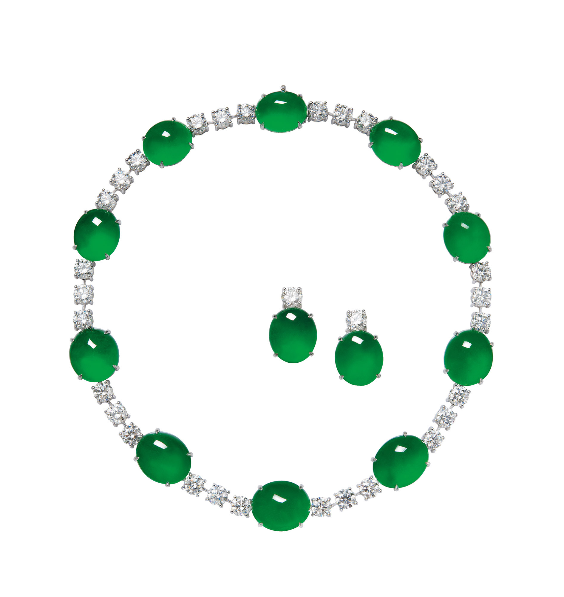A HIGHLY IMPORTANT SET OF ‘IMPERIAL GREEN’ JADEITE CABOCHON AND DIAMOND JEWELRY