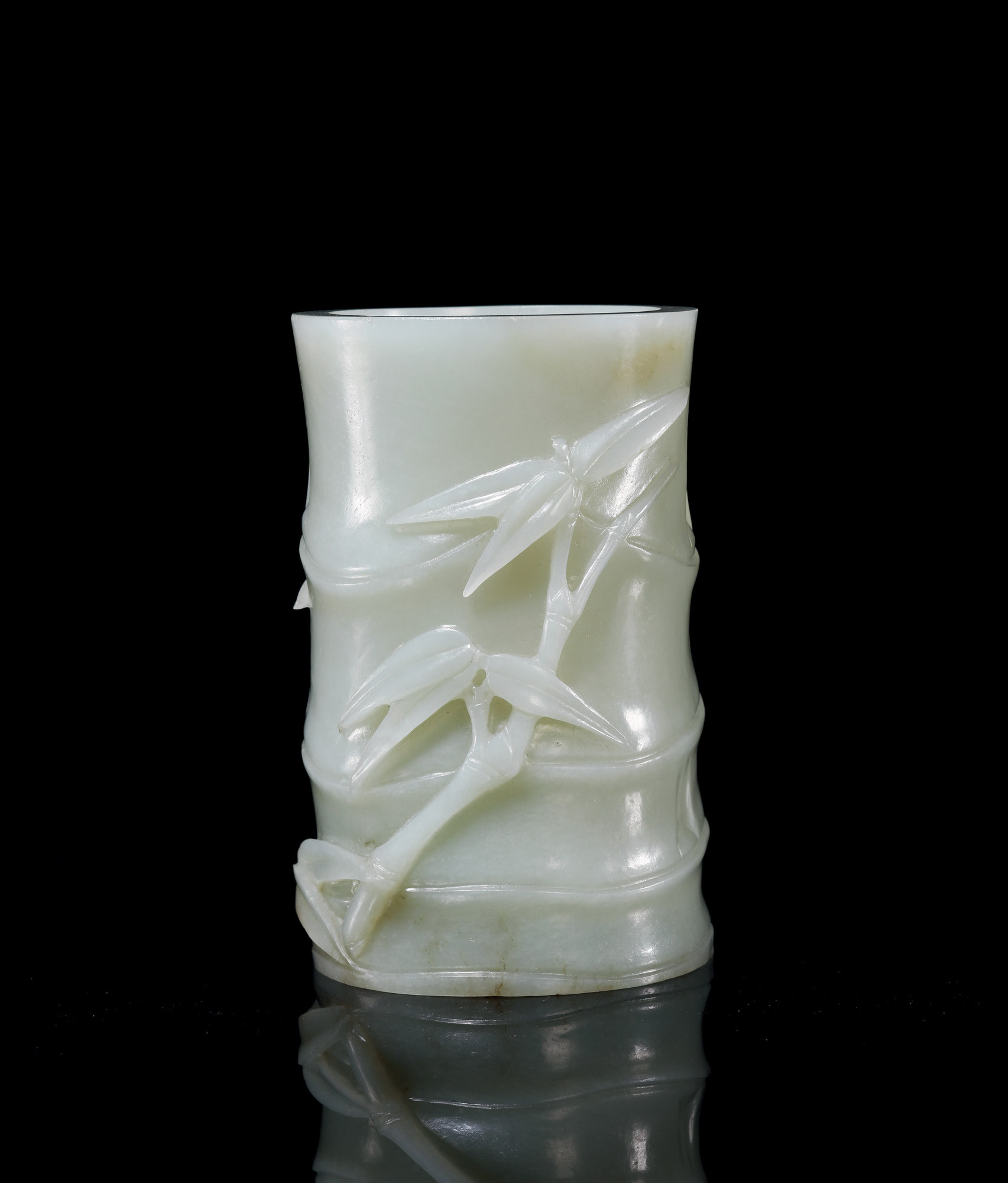 A CARVED WHITE JADE BAMBOO SHAPED BRUSHPOT