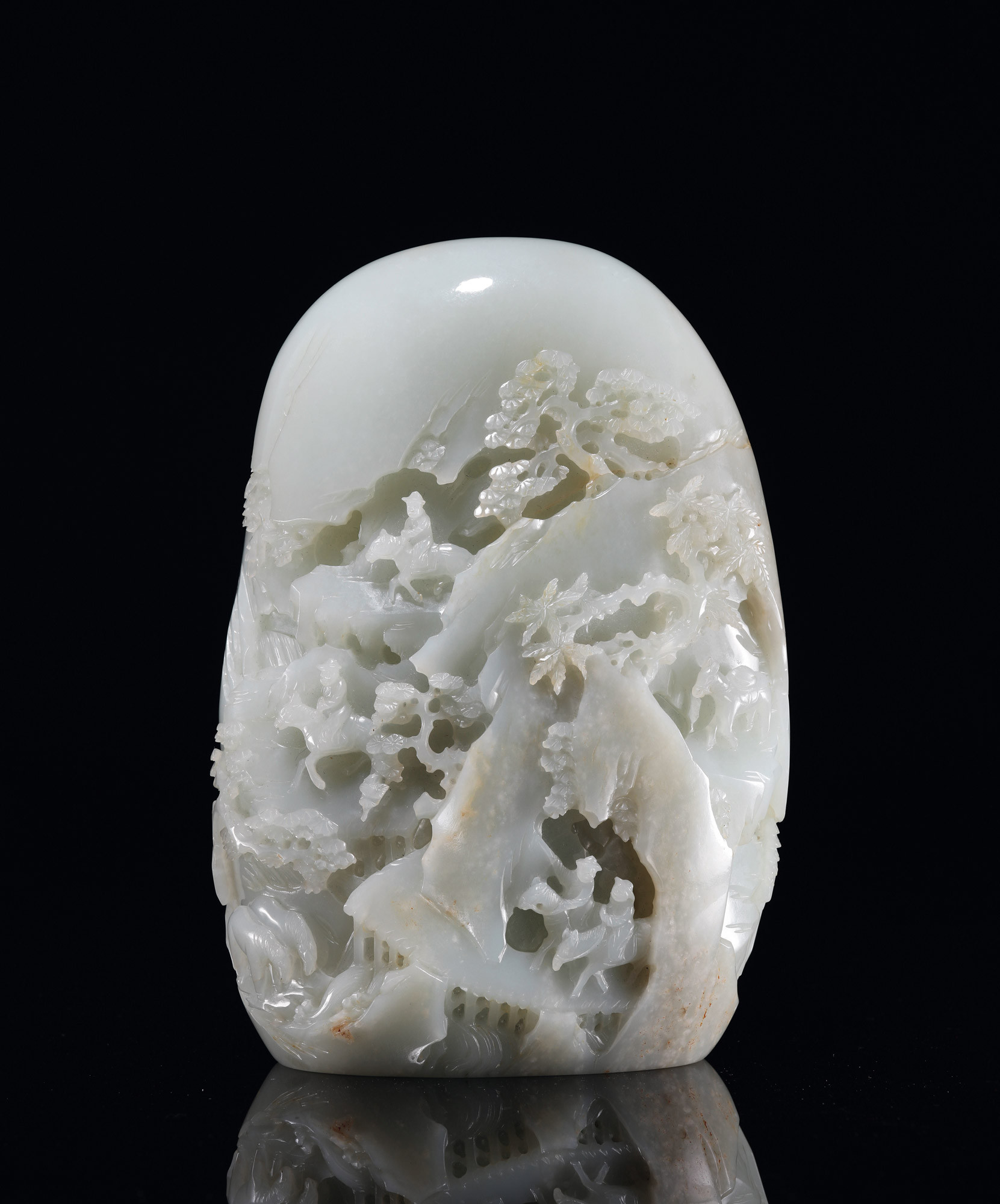 A CARVED WHITE JADE MOUNTAIN BOULDER