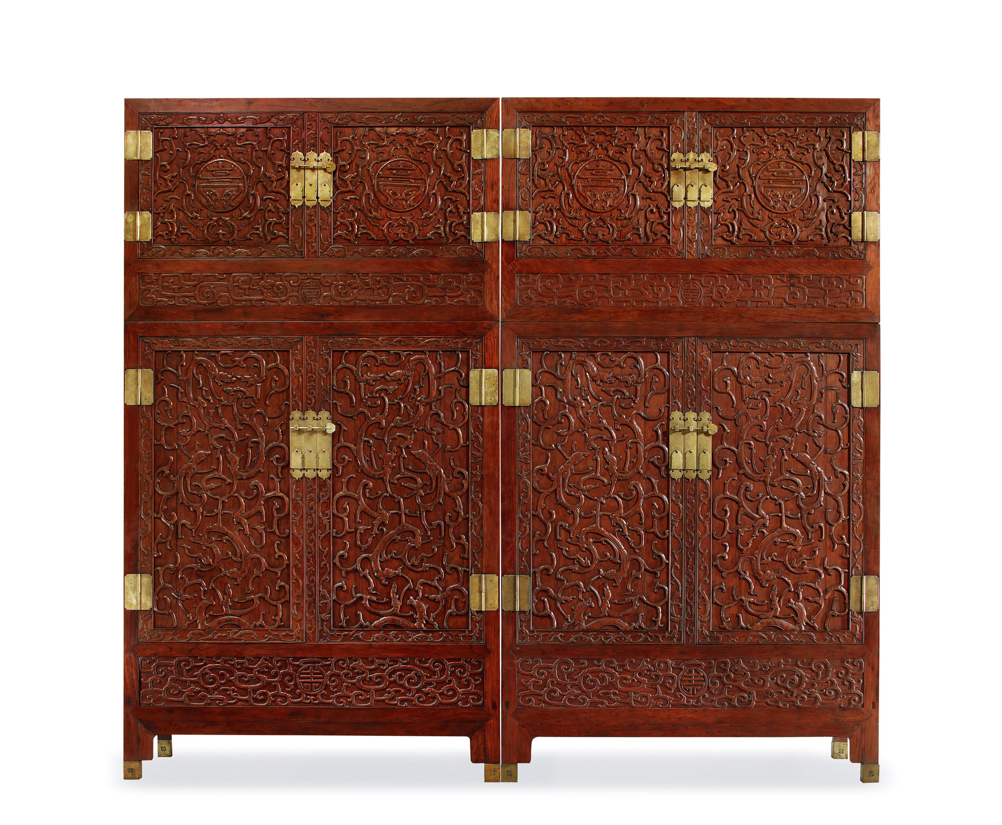 AN EXCEPTIONALLY RARE AND LARGE PAIR OF HUANGHUALI-WOOD ‘DRAGON’ CABINETS