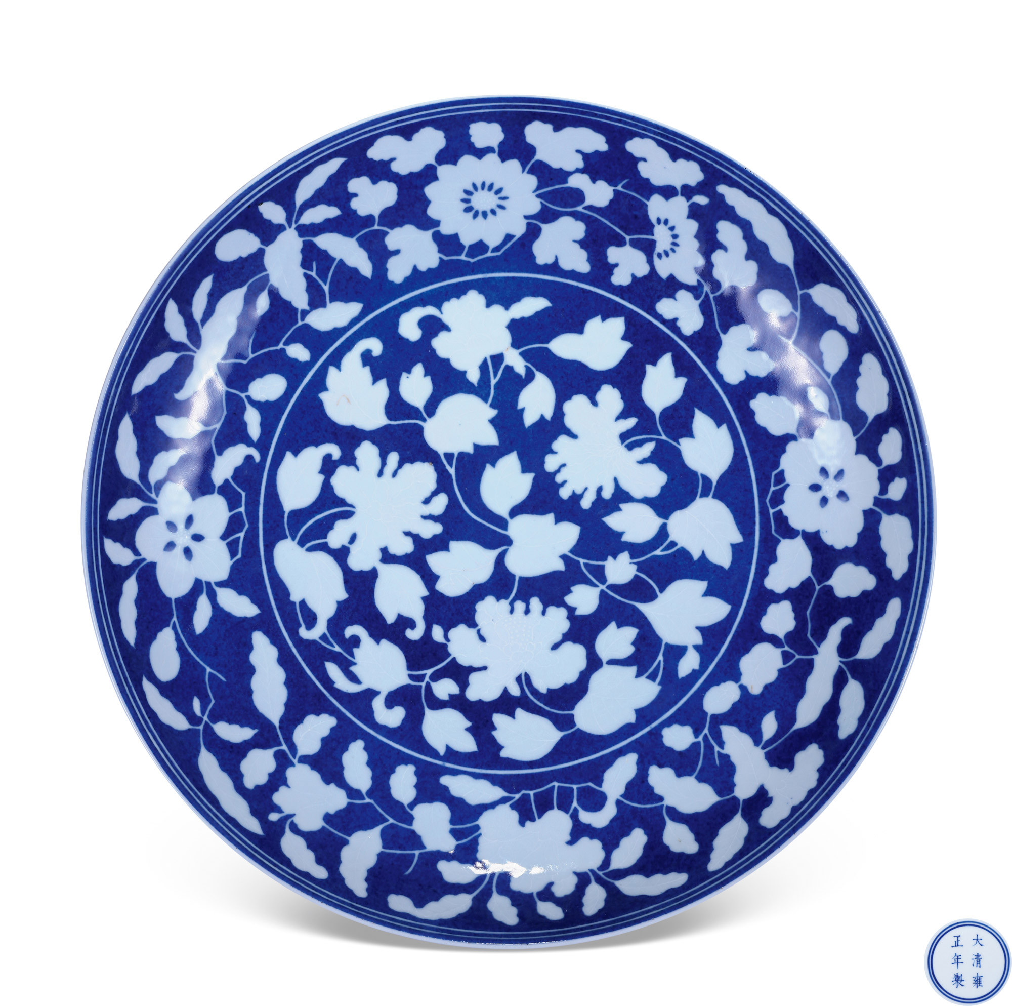 A RARE BLUE GROUND WITH REVERSE-DECORATED‘FLORAL’PLATE