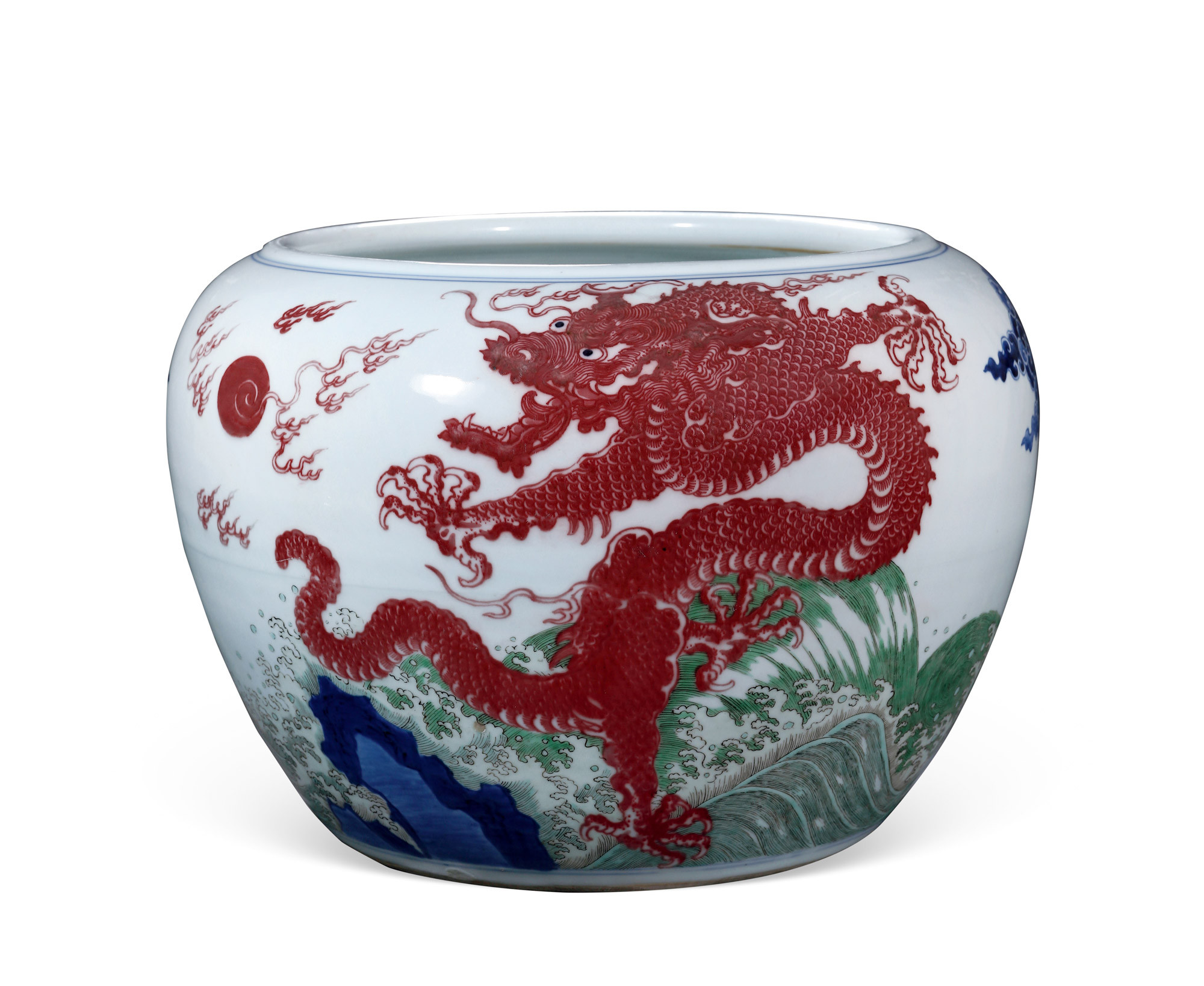 AN EXTREMELY RARE AND IMPORTANT LARGE BLUE AND WHITE WITH COPPER-RED AND WUCAI PAINTED‘TWO DRAGONS WITH PEARL AND SEA-WAVES’JAR
