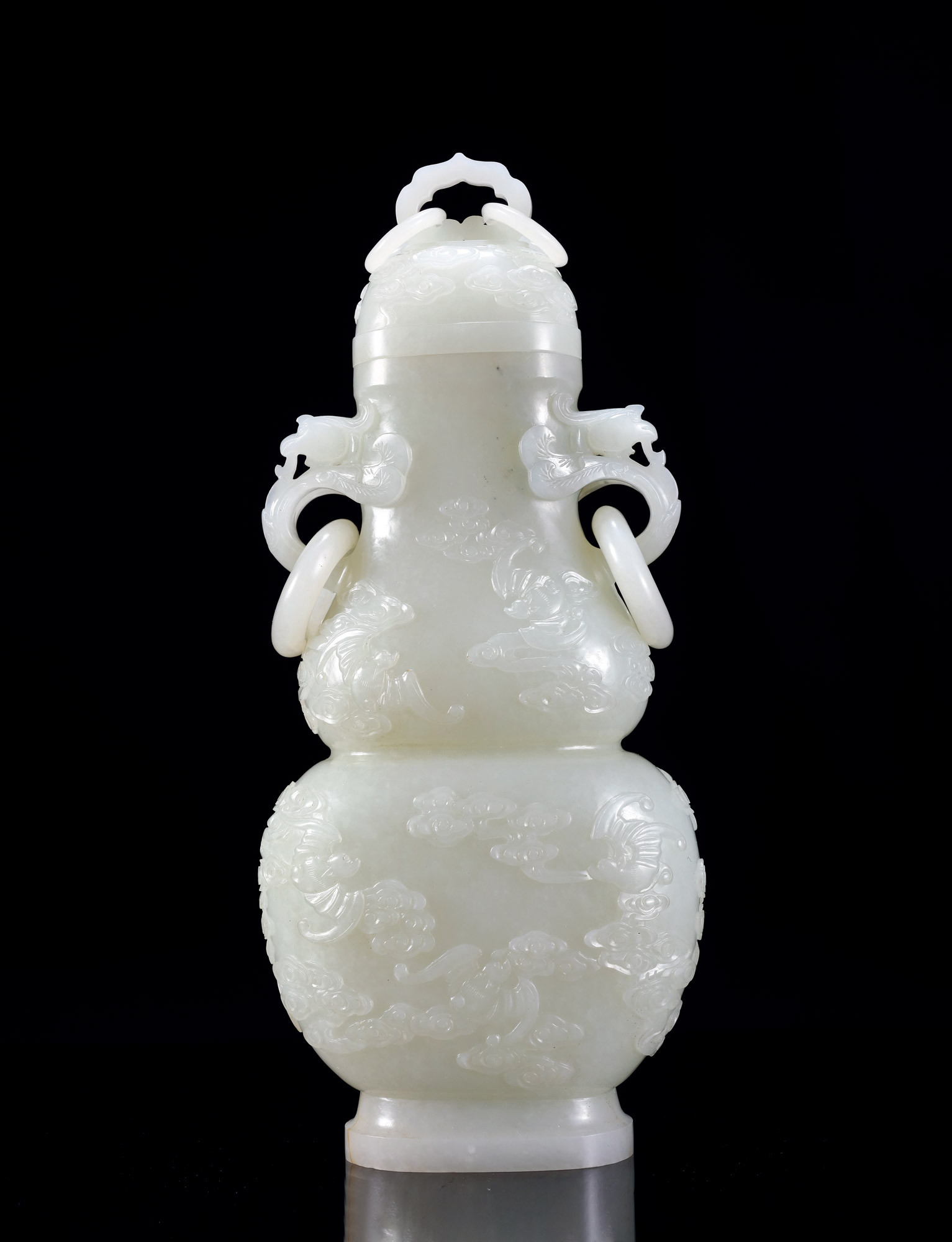 AN IMPORTANT WHITE JADE GOURD-SHAPED‘LONGEVITY’VASE WITH COVER