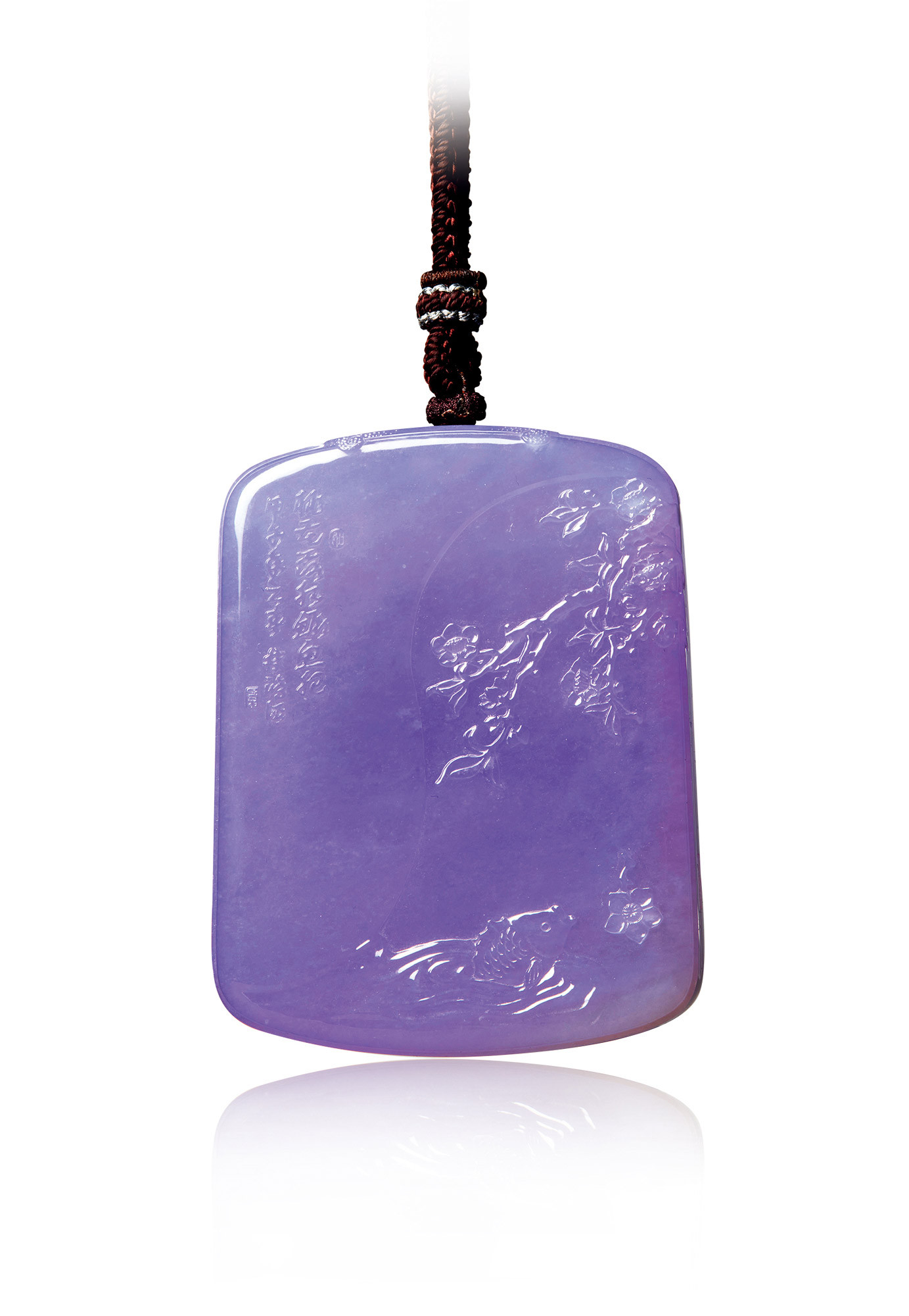 AN IMPORTANT AND VERY FINE LAVENDER JADEITE PENDANT