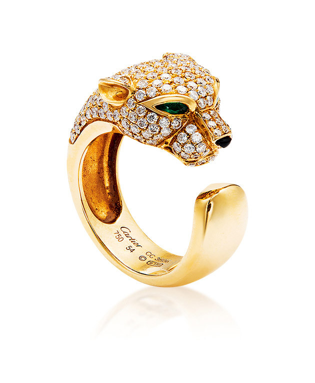 A DIAMOND, EMERALD AND ONYX ’PANTHERE’ RING, BY CARTIER