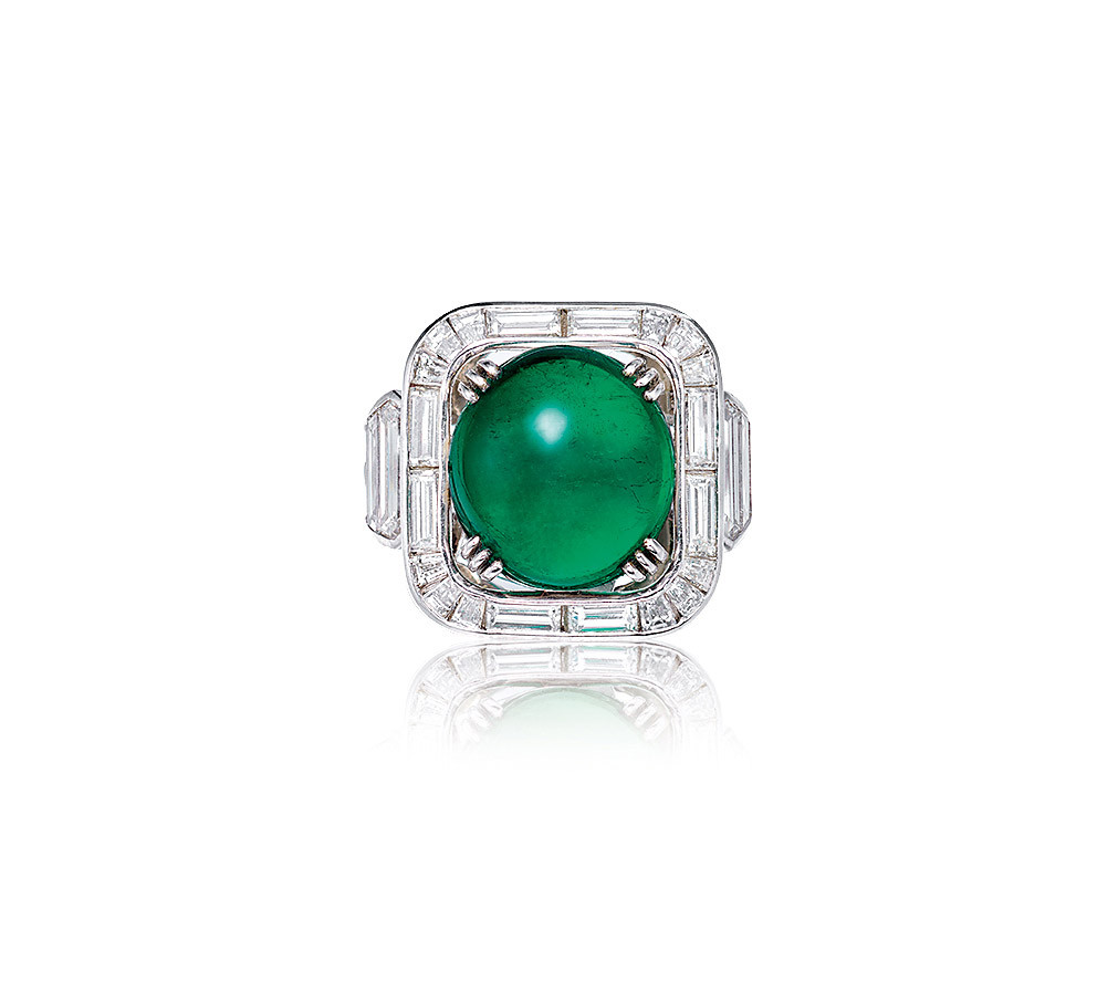 A 8.25 CARAT colombian EMERALD AND DIAMOND RING